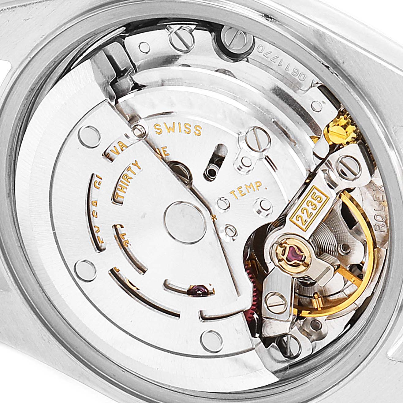 The image shows a close-up view of the internal movement of a Rolex Datejust 79173 Women's Steel and Gold (two tone) Champagne Dial 79173 Women's Steel and Gold (two tone) Champagne Dial watch.