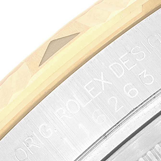This image shows a close-up view of the bezel and engraved markings on a Rolex Turn-o-Graph 116263 Men
s Steel and Gold (two tone) White Dial 116263 Men
s Steel and Gold (two tone) White Dial watch.
