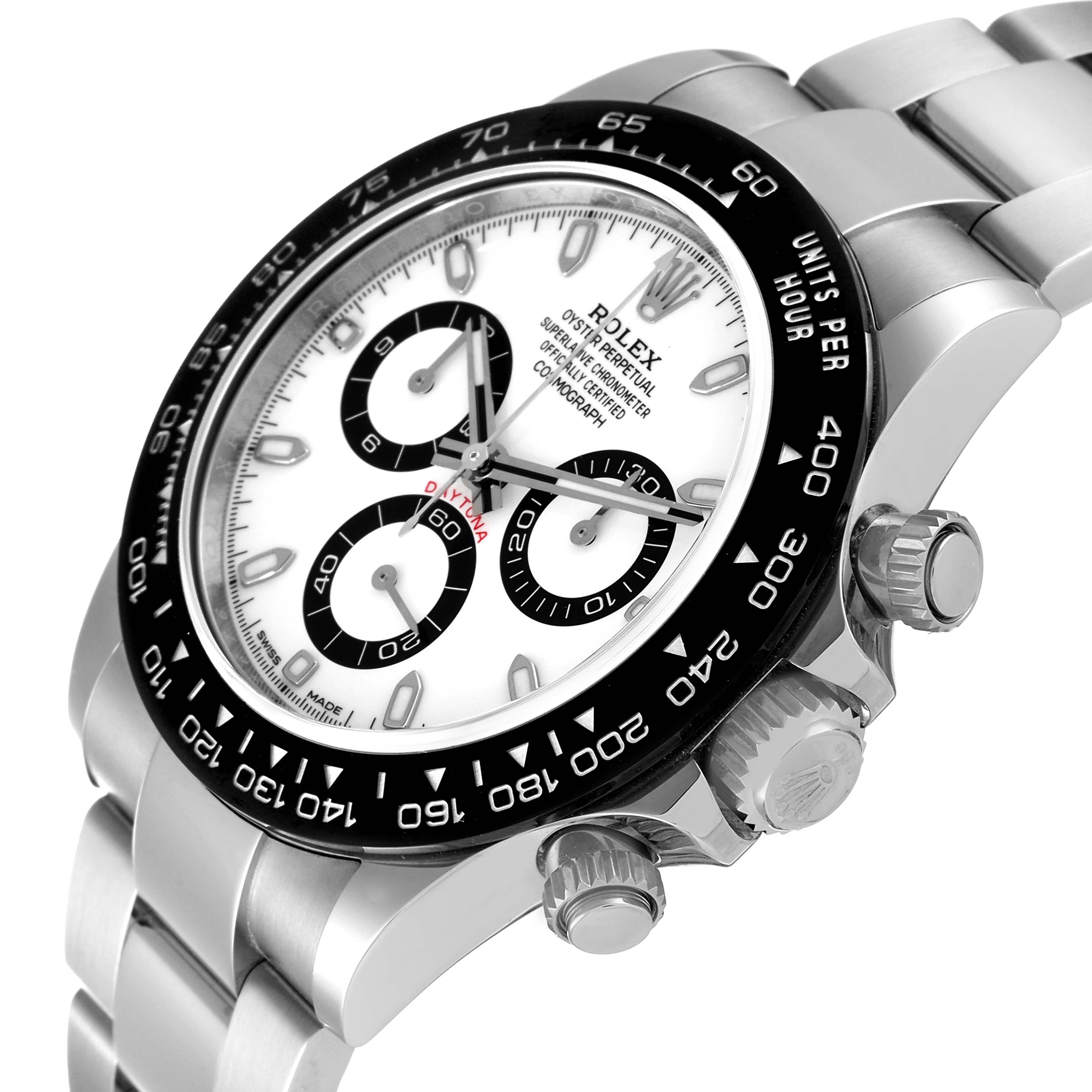 The image shows a close-up angled view of a Rolex Daytona 116500 Men's Stainless Steel White Dial 116500 Men's Stainless Steel White Dial watch, highlighting its bezel, dial, and crown.