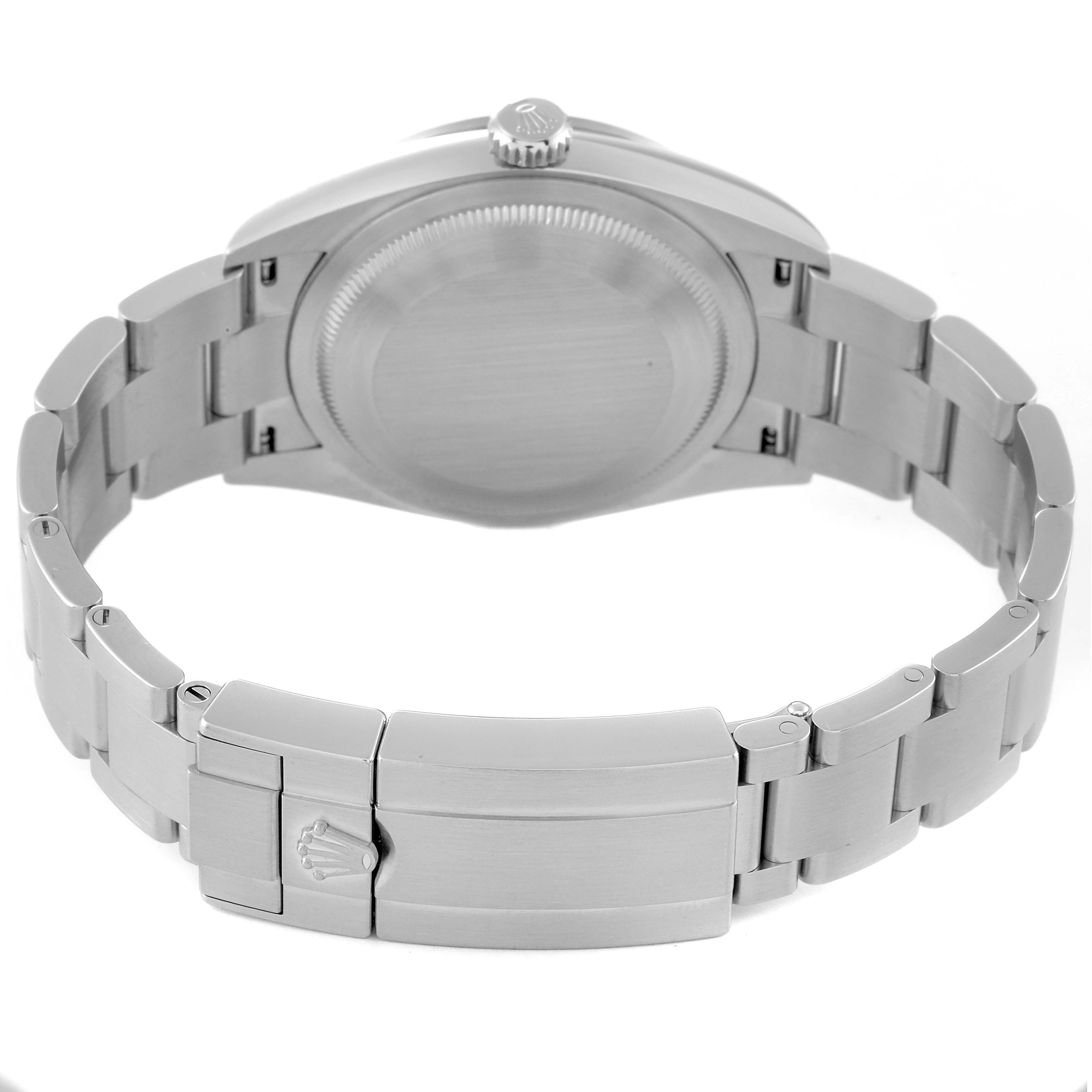 The image shows the back view of a Rolex Explorer 124270 Men
s Stainless Steel Black Dial 124270 Men
s Stainless Steel Black Dial watch, including the case back and the bracelet with the clasp.