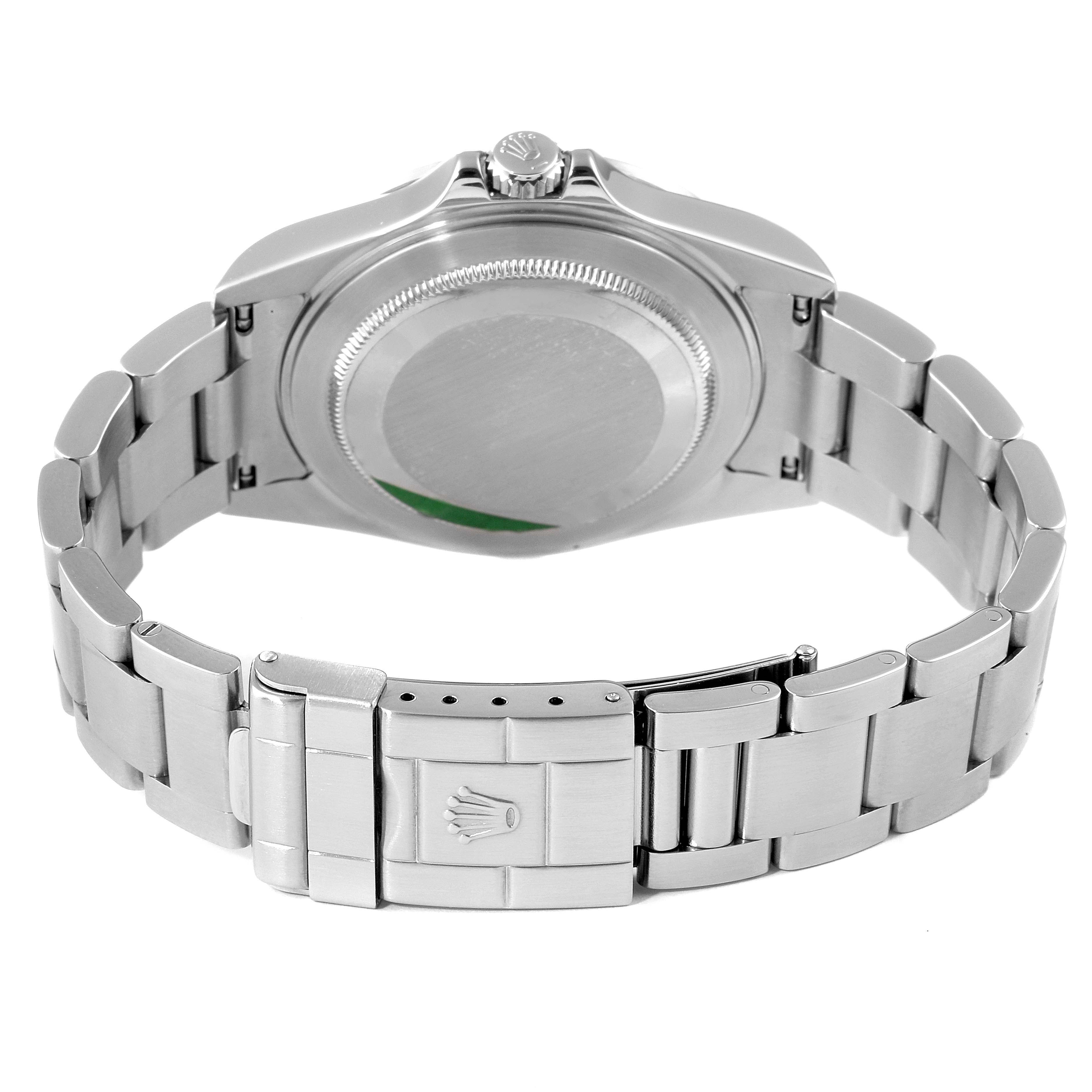 The image shows the back view of a Rolex Explorer 16570 Men
s Stainless Steel White Dial 16570 Men
s Stainless Steel White Dial watch, including the closed case back and a partial view of the bracelet and clasp.