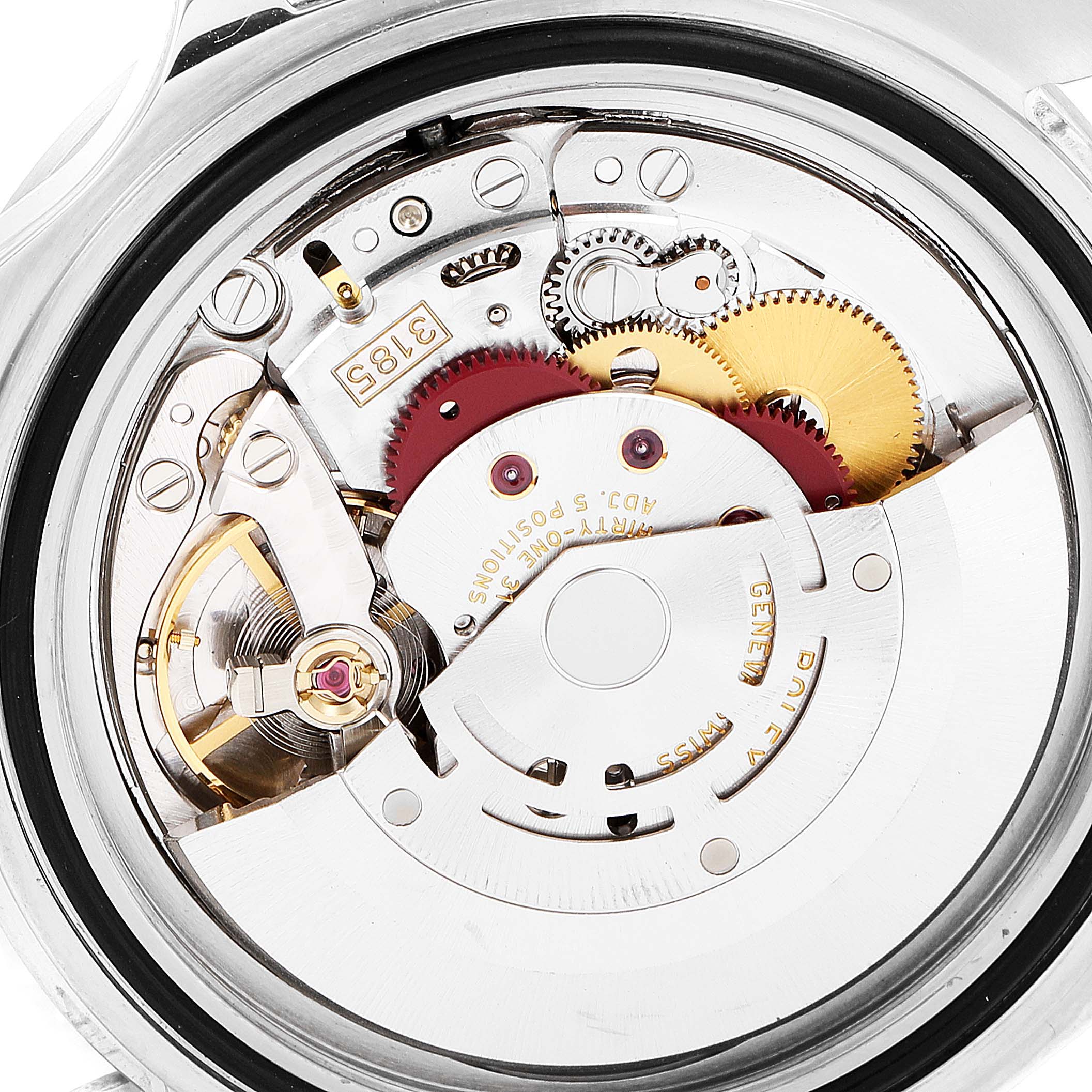 The image shows a close-up of the mechanical movement of a Rolex Explorer 16570 Men
s Stainless Steel White Dial 16570 Men
s Stainless Steel White Dial watch, highlighting gears and intricate components.