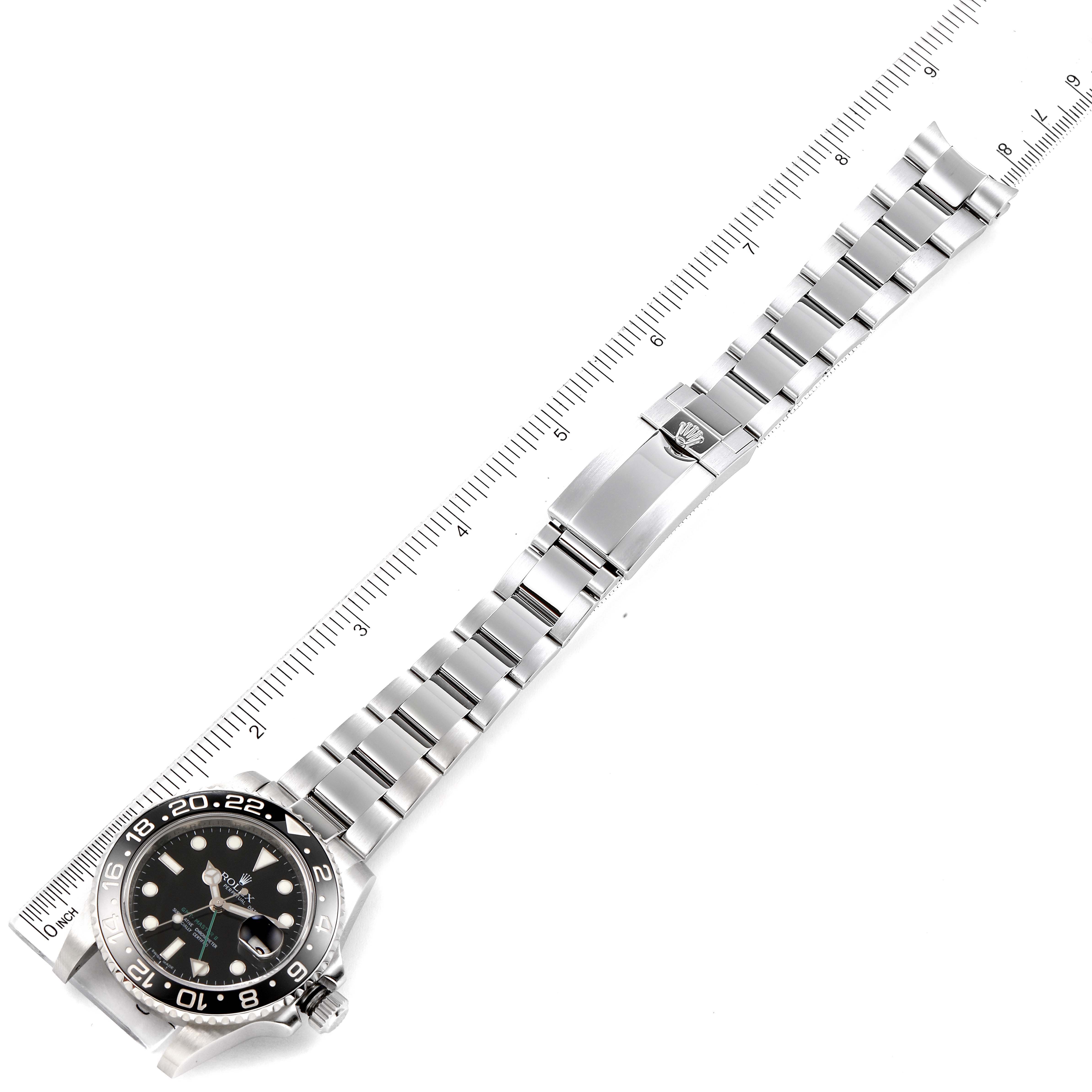 The Rolex GMT-Master 116710 Men
s Stainless Steel Black Dial 116710 Men
s Stainless Steel Black Dial watch is displayed flat, featuring its face, bezel, and full metal bracelet with a clasp.