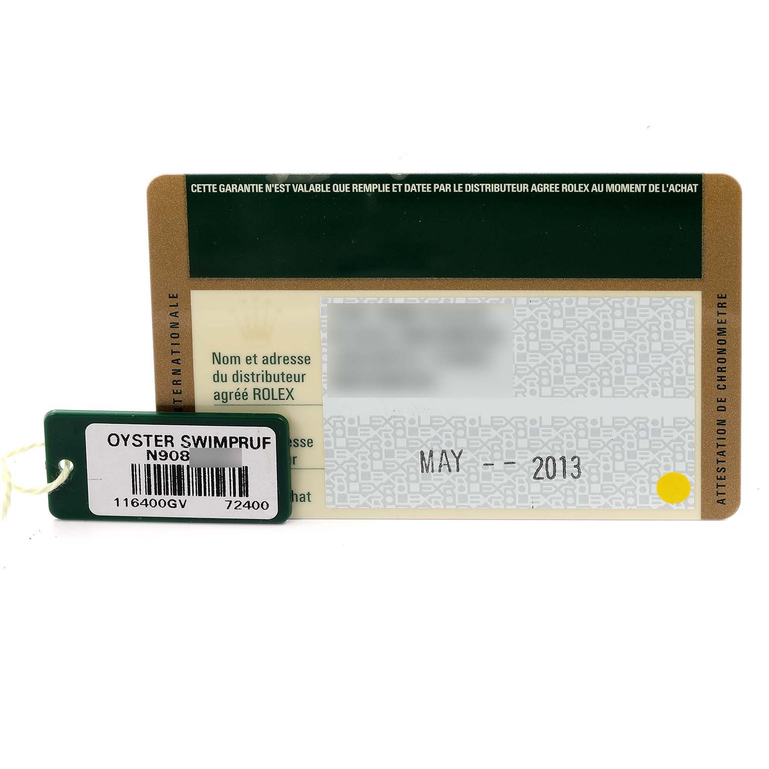 The image shows a Rolex Milgauss 116400 Men's Stainless Steel Black Dial 116400 Men's Stainless Steel Black Dial model warranty card and tag with details and date.