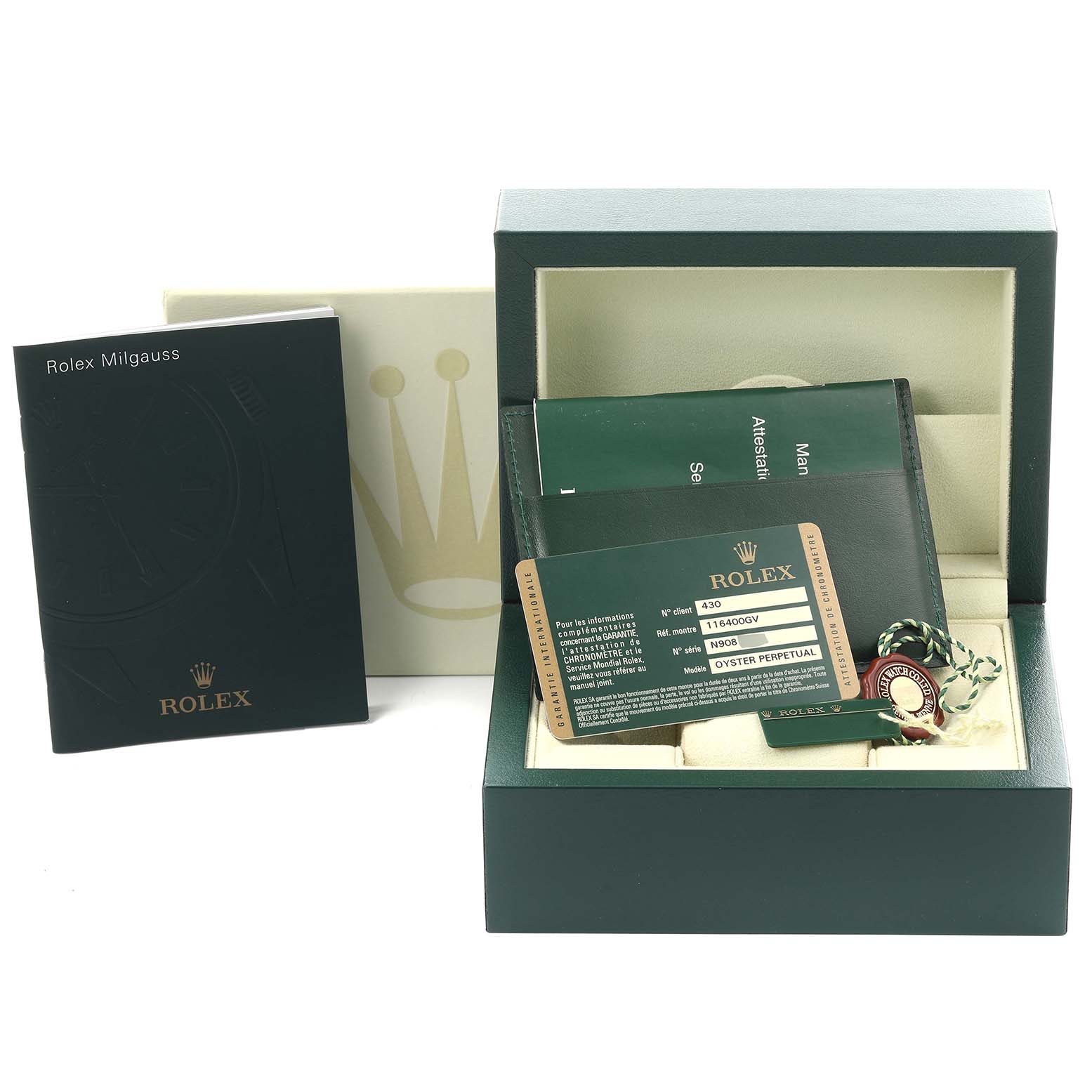 The image shows a Rolex Milgauss 116400 Men's Stainless Steel Black Dial 116400 Men's Stainless Steel Black Dial box with warranty card, manuals, and tag, angled slightly from the front.