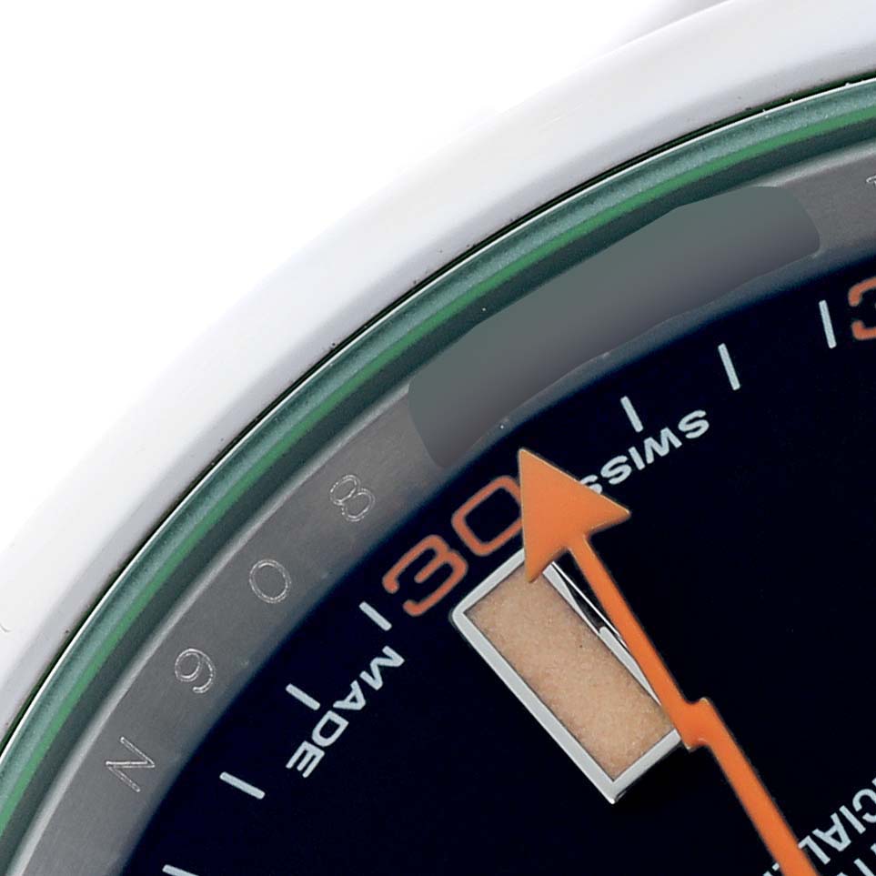The image shows a close-up of the dial and hands of the Rolex Milgauss 116400 Men's Stainless Steel Black Dial 116400 Men's Stainless Steel Black Dial, featuring part of the chapter ring and orange accents.