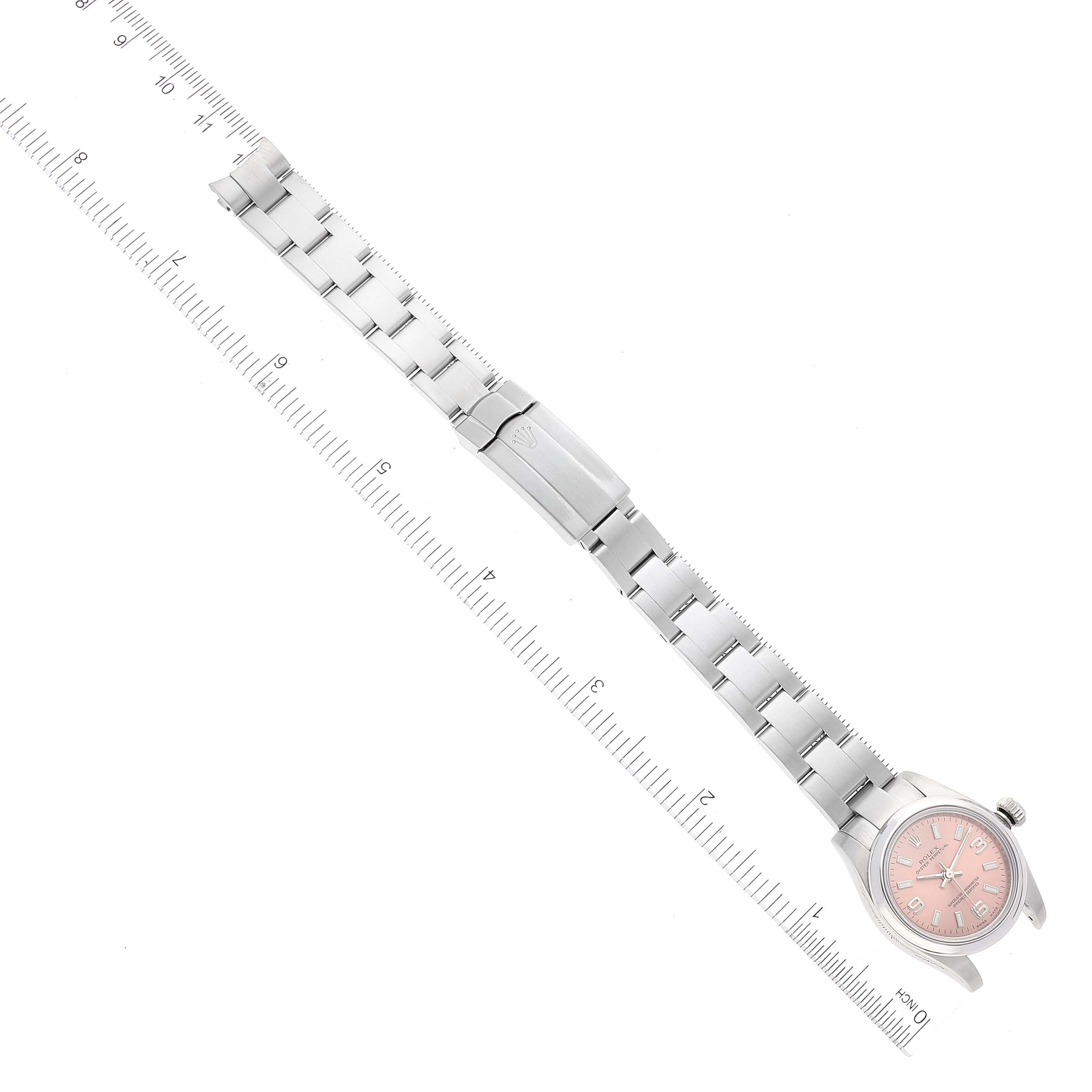 The image shows a top-down view of a Rolex Oyster Perpetual 176200 Women
s Stainless Steel Pink Dial 176200 Women
s Stainless Steel Pink Dial watch with a pink dial, displaying the entire bracelet and clasp.