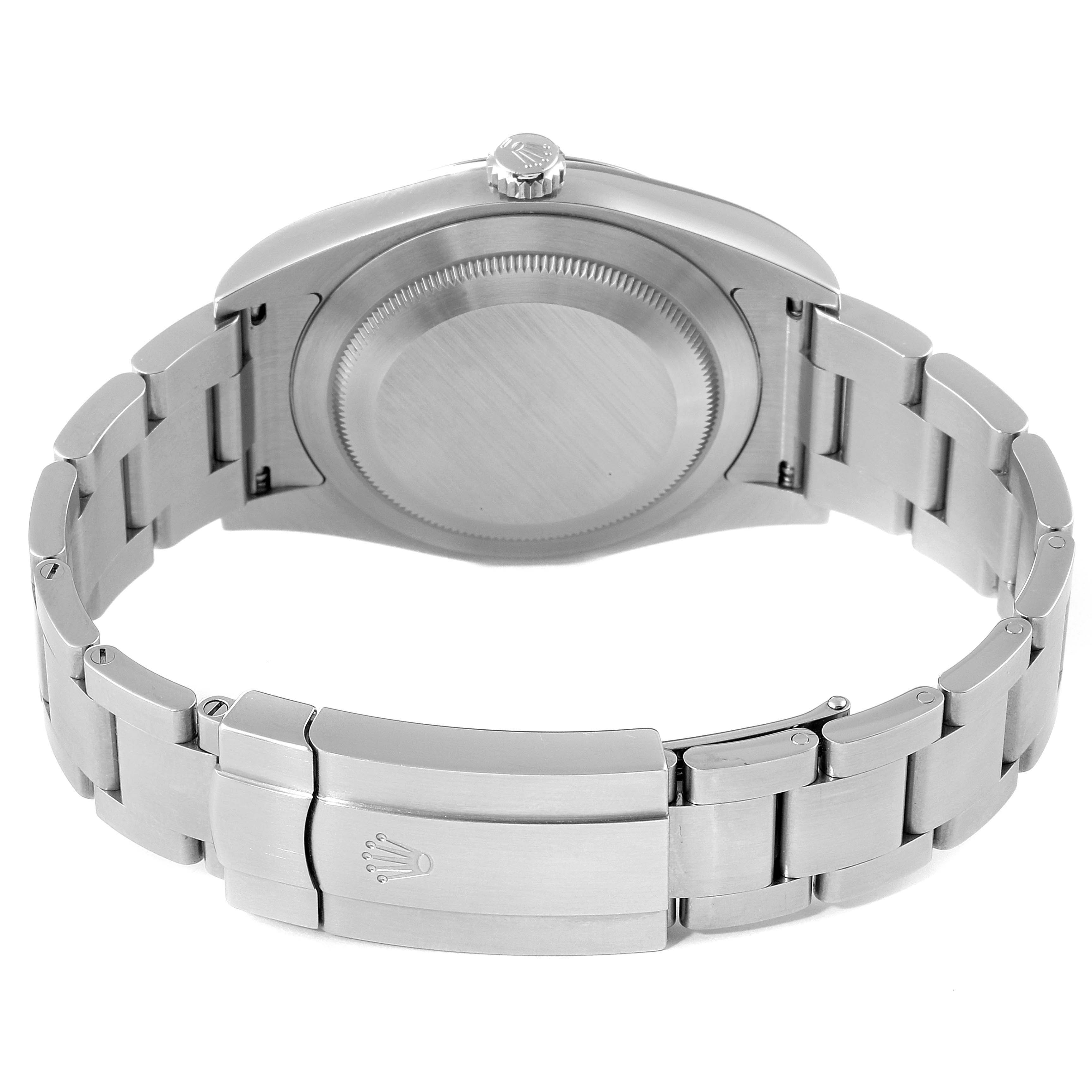 The image shows the back and band of a Rolex Oyster Perpetual 114300 Men
s Stainless Steel Black Dial 114300 Men
s Stainless Steel Black Dial watch, including the case back and clasp.