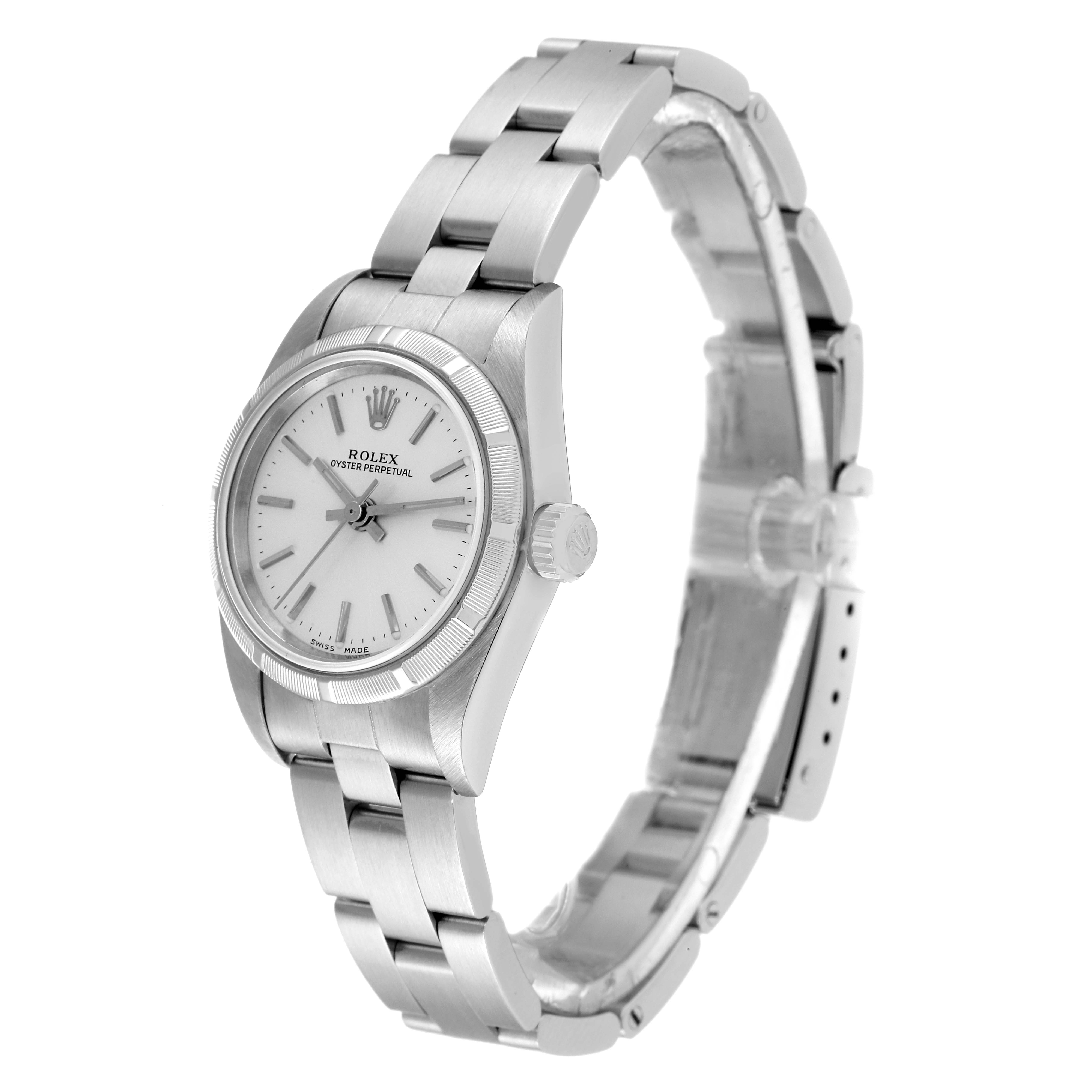 The image shows a side angle of a Rolex Oyster Perpetual 76030 Women
s Stainless Steel Silver Dial 76030 Women
s Stainless Steel Silver Dial watch, highlighting the bracelet, crown, and face.