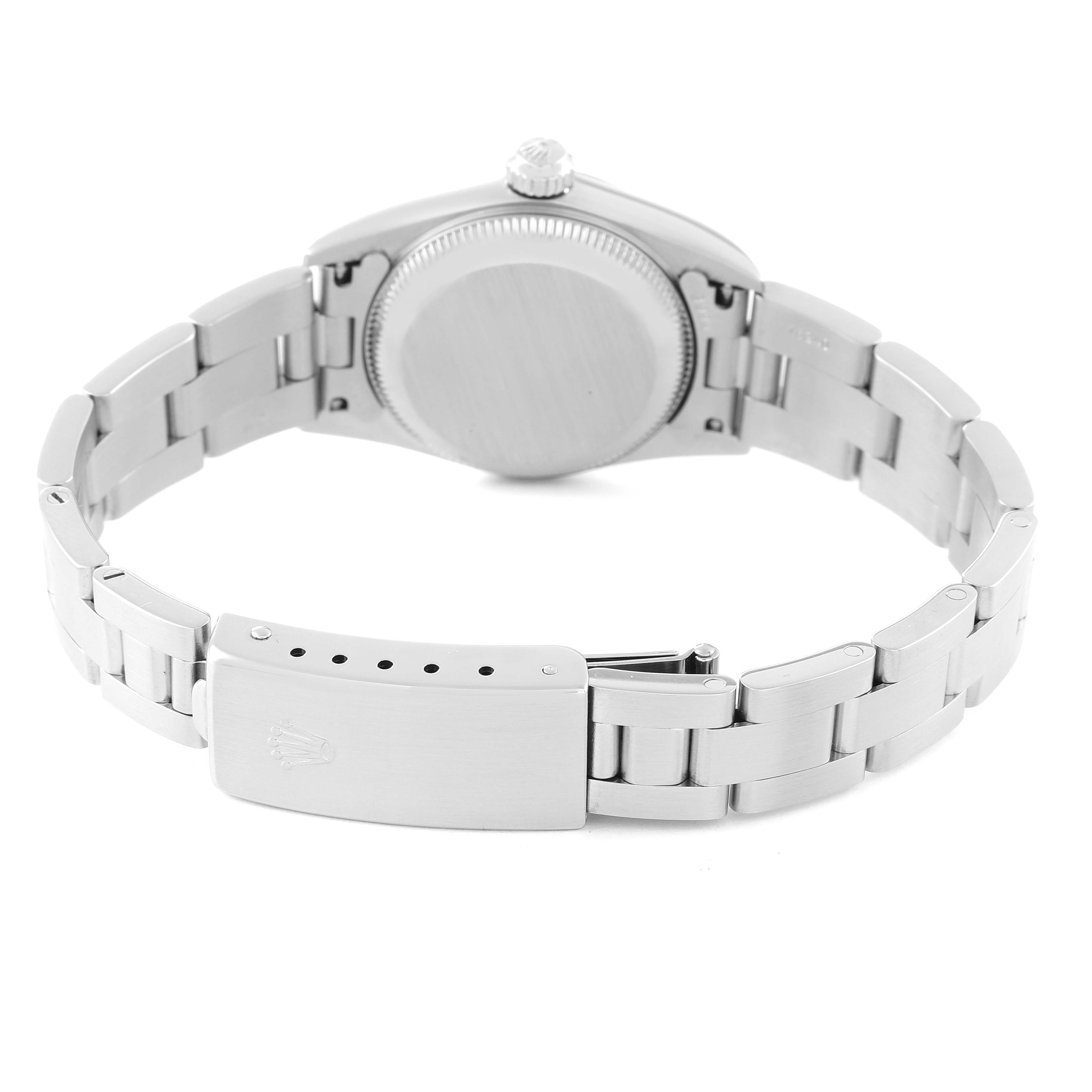 The image shows the back case and bracelet clasp of a Rolex Oyster Perpetual 76080 Women
s Stainless Steel Silver Dial 76080 Women
s Stainless Steel Silver Dial watch.