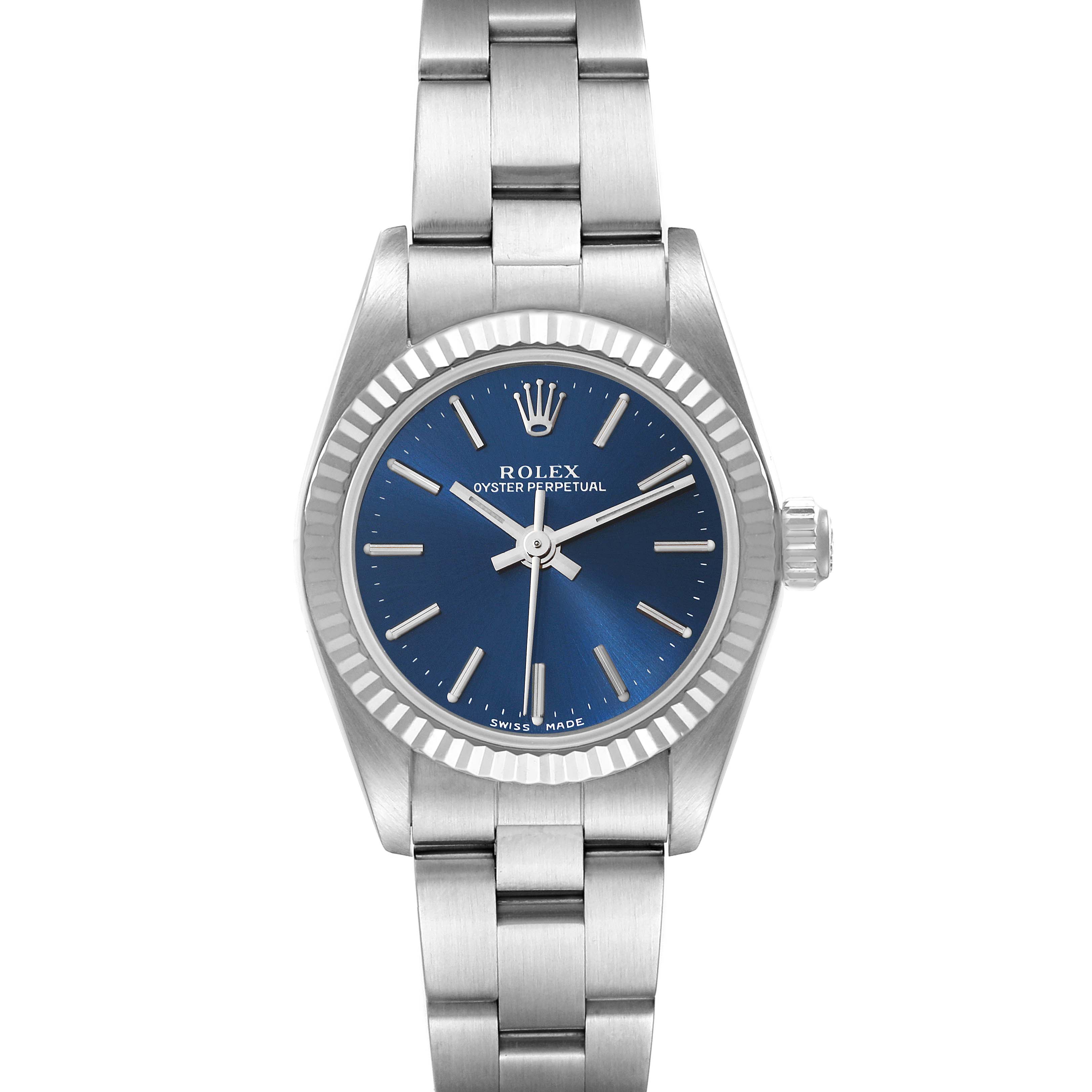 The image shows a front view of a Rolex Oyster Perpetual 76094 Women
s Stainless Steel Blue Dial 76094 Women
s Stainless Steel Blue Dial watch with a blue dial and a stainless steel bracelet.