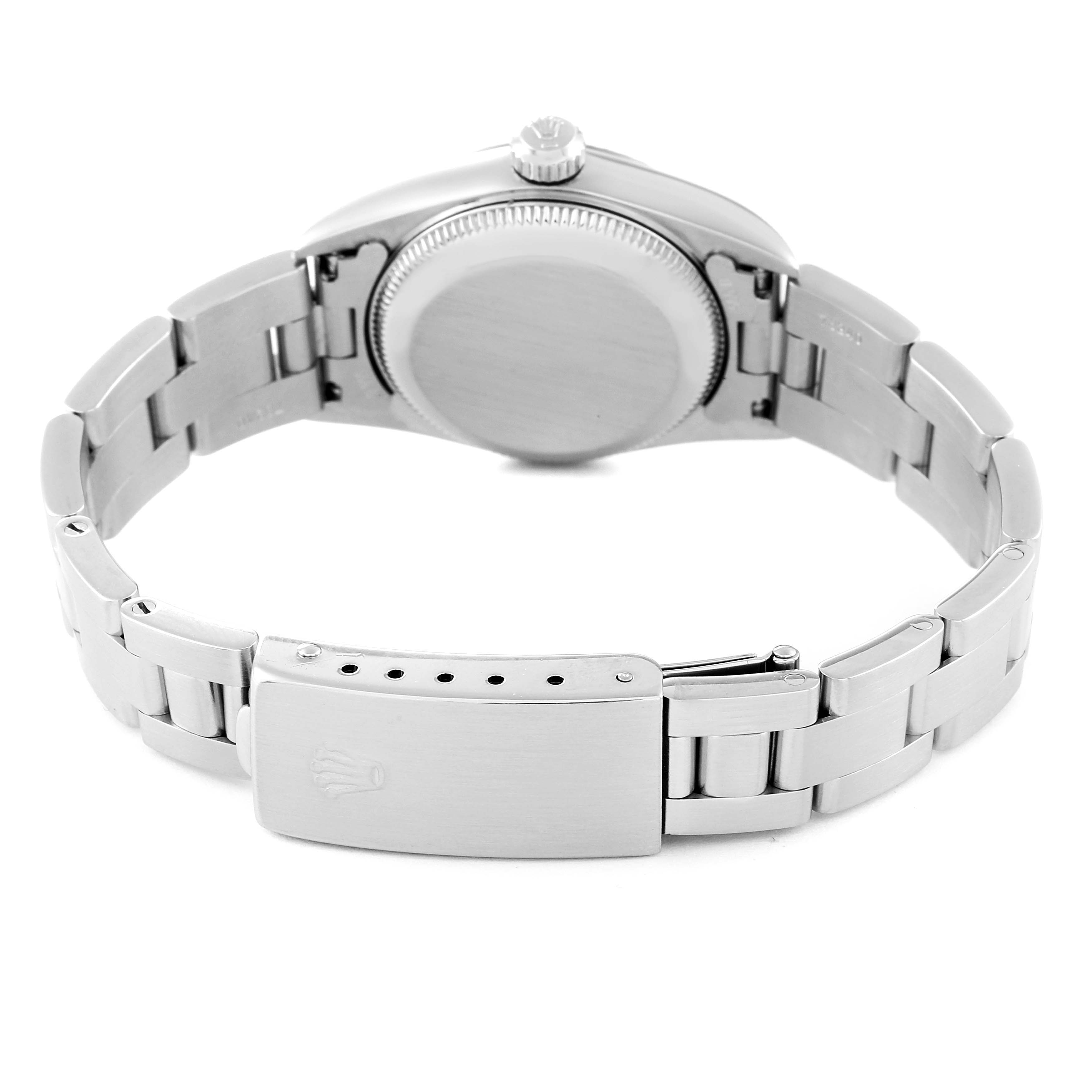 The image shows the back view of the Rolex Oyster Perpetual 76094 Women
s Stainless Steel Blue Dial 76094 Women
s Stainless Steel Blue Dial watch, focusing on its case back, crown, and metal bracelet.