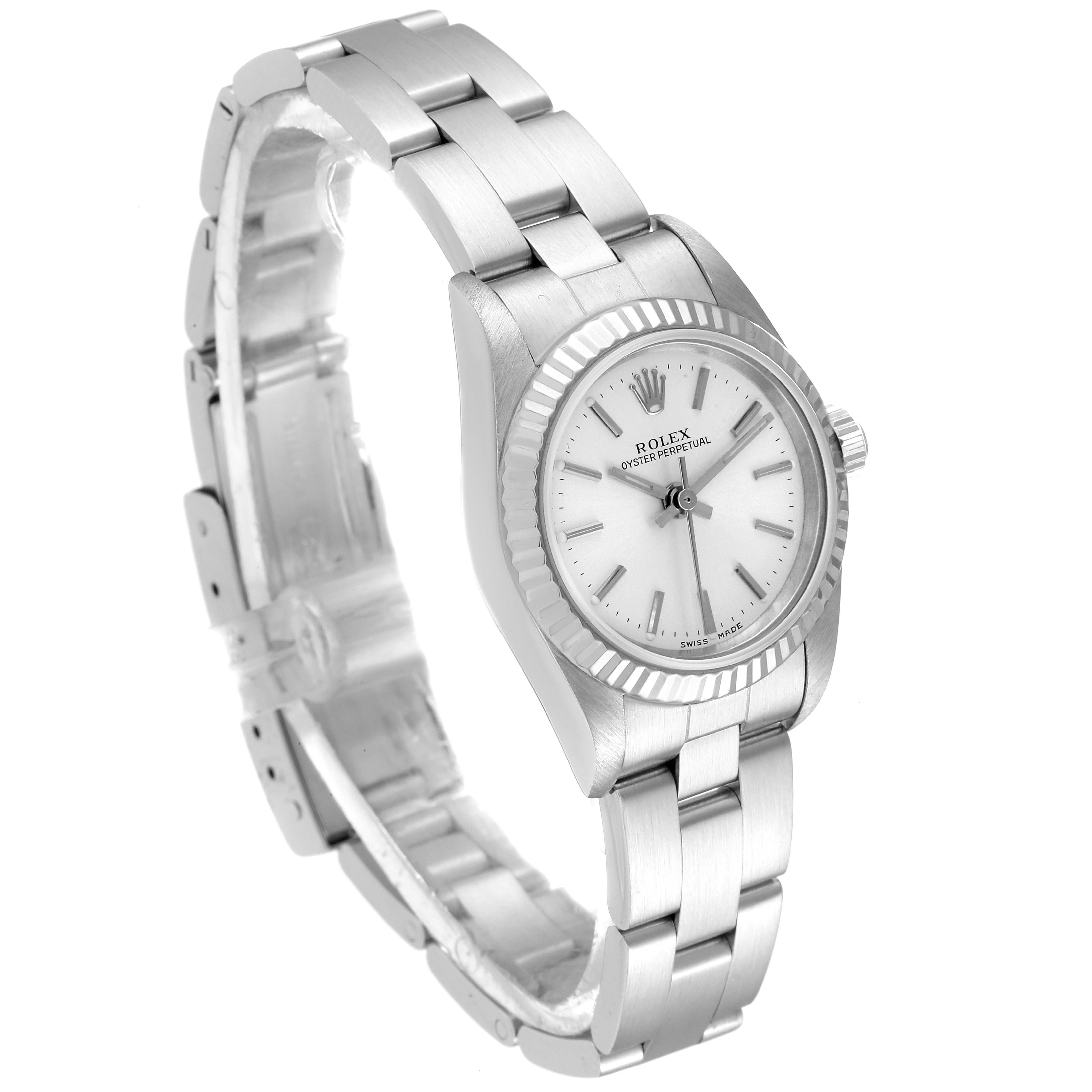 The image shows a side angle view of a silver Rolex Oyster Perpetual 76094 Women's Stainless Steel Silver Dial 76094 Women's Stainless Steel Silver Dial watch, featuring its bezel, dial, and bracelet.