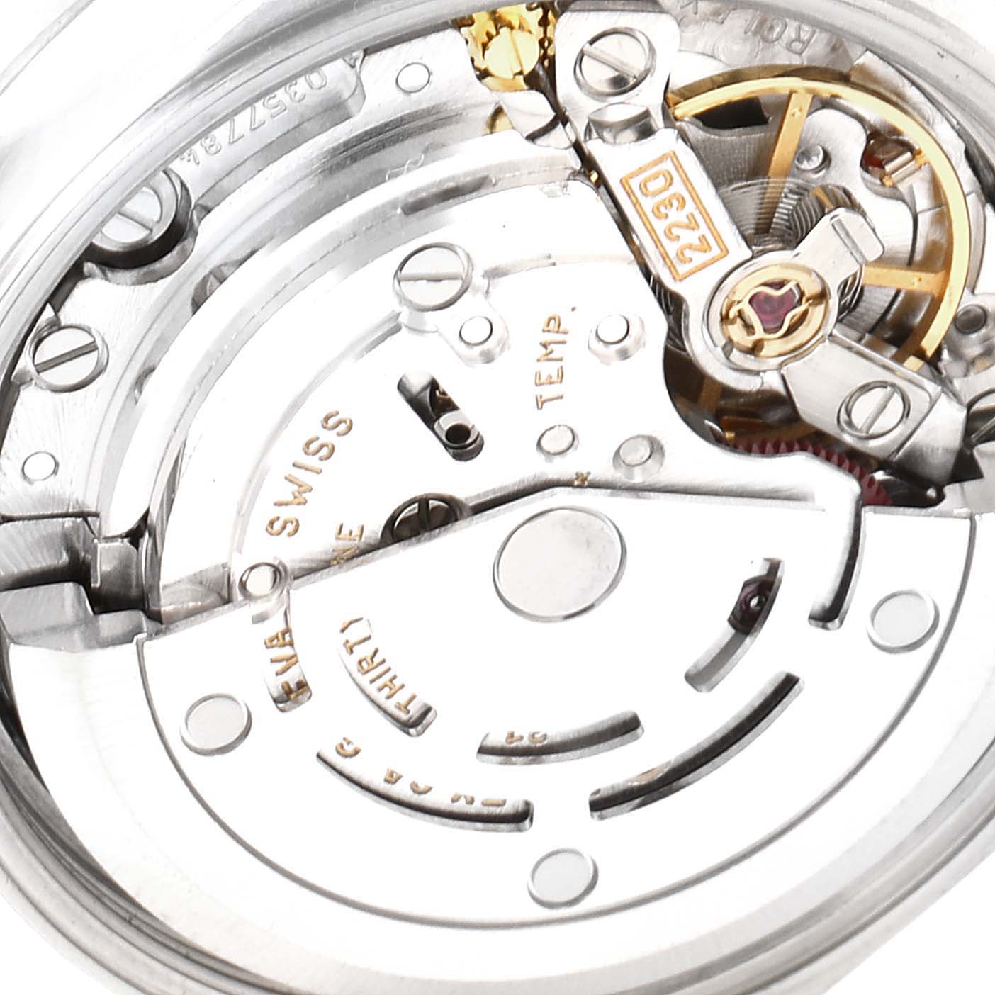 This image shows the intricate internal mechanism of the Rolex Oyster Perpetual 76094 Women's Stainless Steel Silver Dial 76094 Women's Stainless Steel Silver Dial watch from a close-up angle.