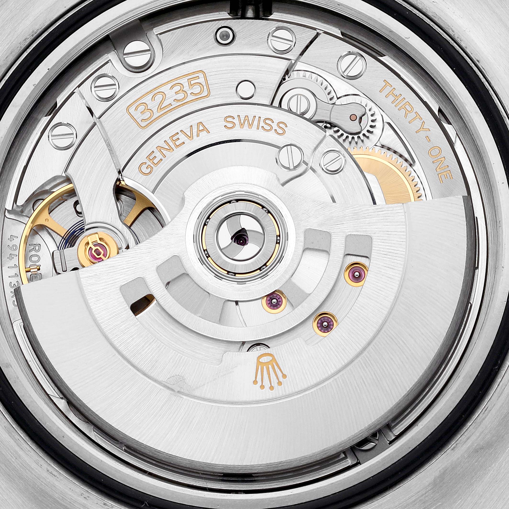 The image shows the intricate internal mechanics of a Rolex Sea-Dweller 126603 Men
s Steel and Gold (two tone) Black Dial 126603 Men
s Steel and Gold (two tone) Black Dial model, focusing on parts like the rotor and gear train.
