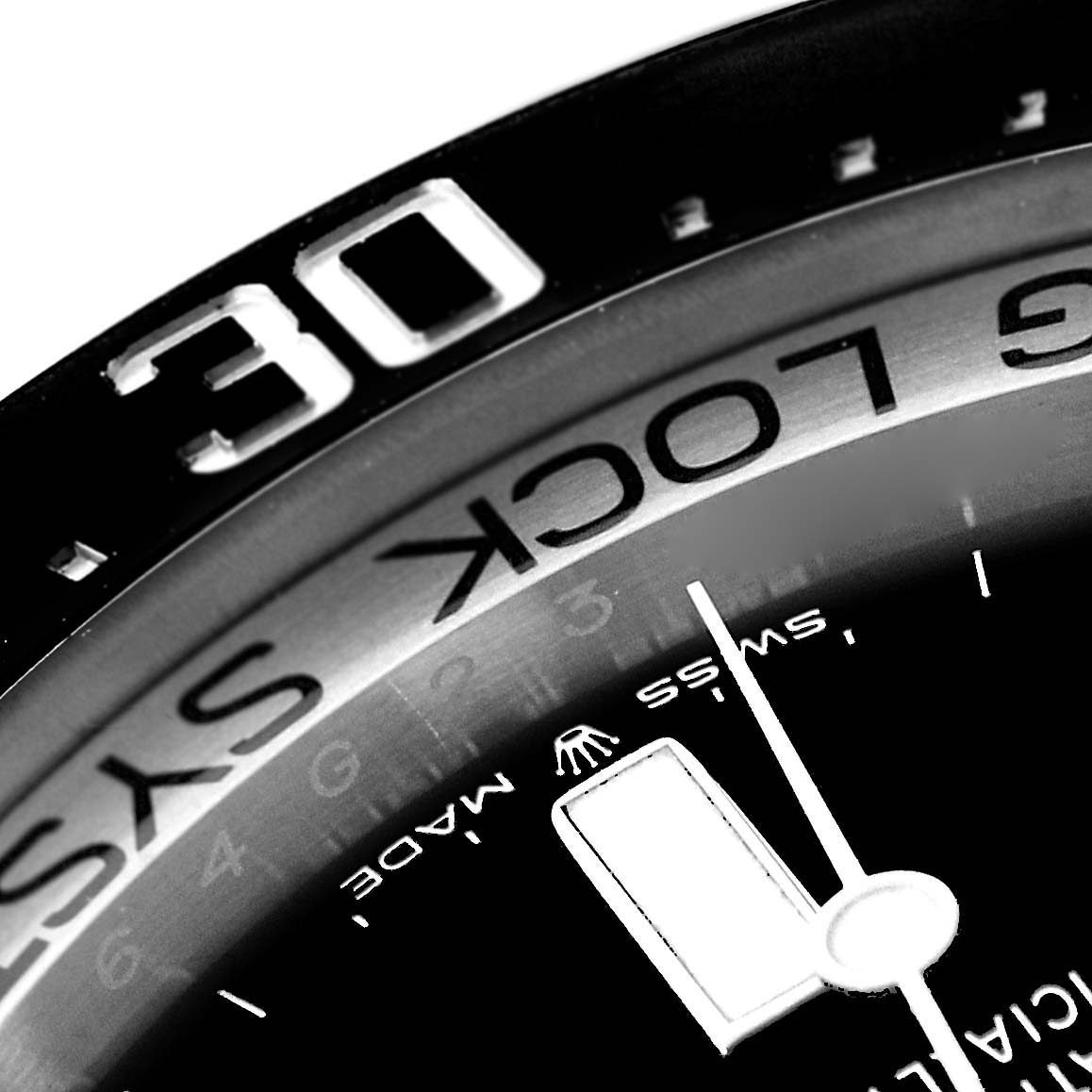Close-up of the Rolex Sea-Dweller 126660 Men's Stainless Steel Black Dial 126660 Men's Stainless Steel Black Dial watch dial, showing the bezel with the "30" marker and part of the clock hands.