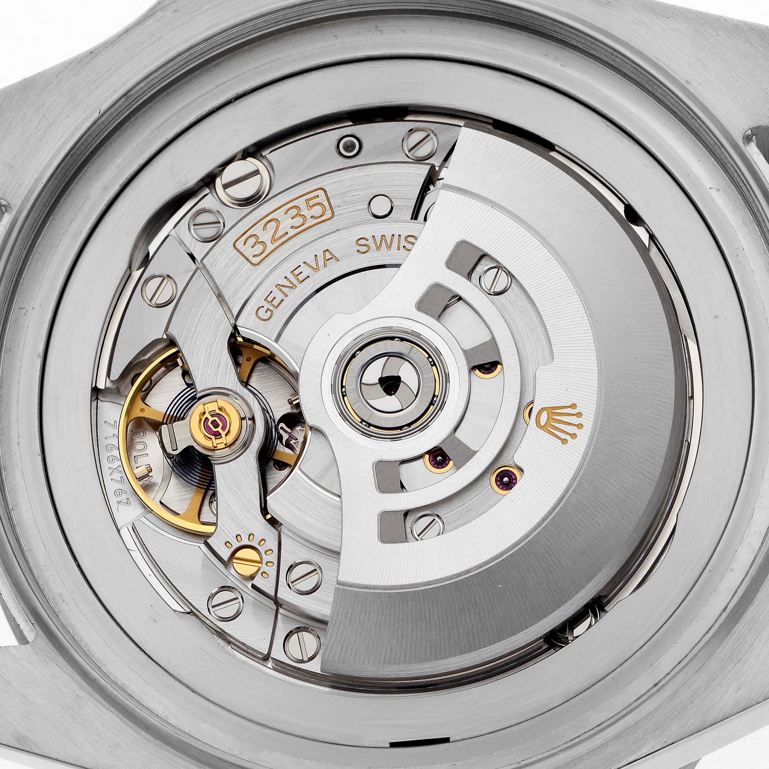 The image shows a close-up of the movement inside a Rolex Sea-Dweller 126660 Men's Stainless Steel Black Dial watch, highlighting the intricate mechanics.