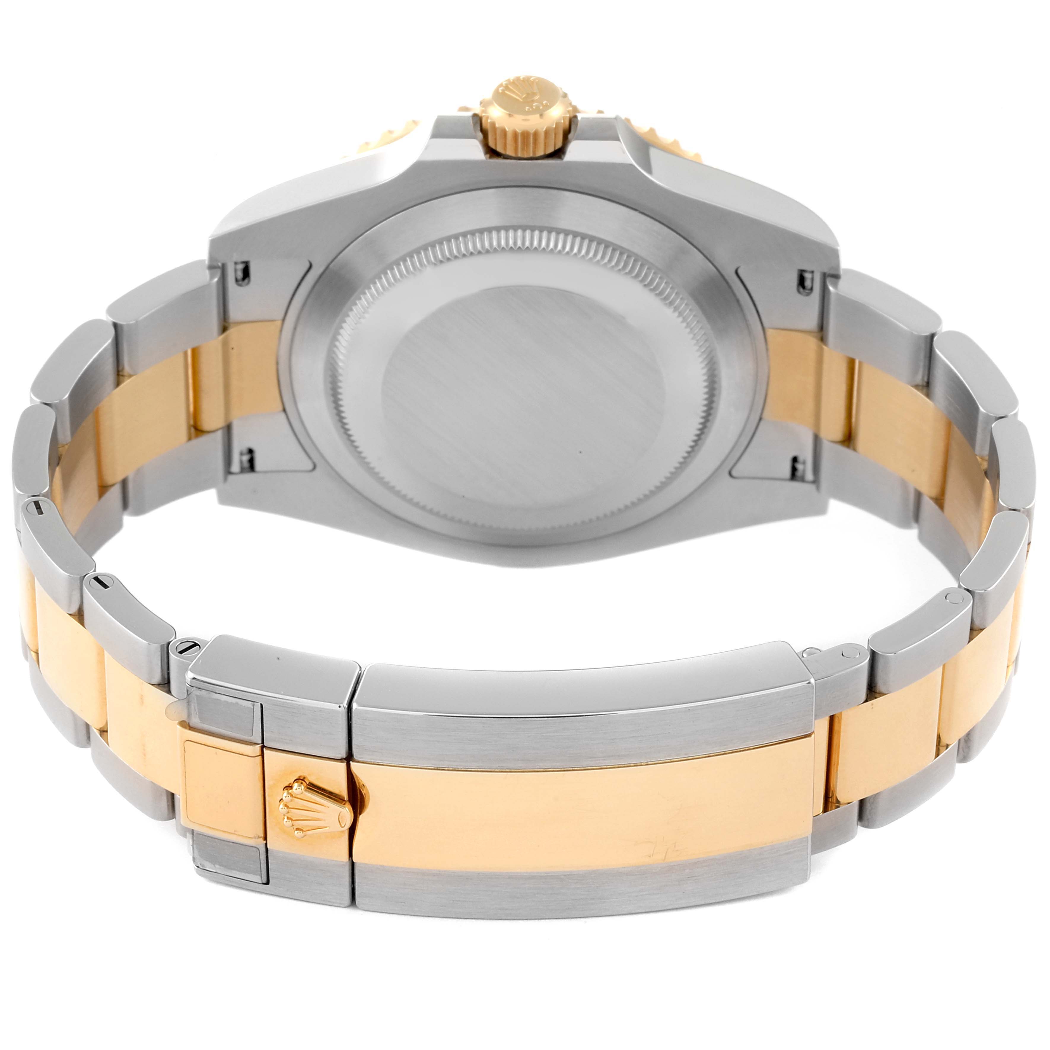 The image shows the back side and clasp of a Rolex Submariner 126613 Men's Steel and Gold (two tone) Blue Dial 126613 Men's Steel and Gold (two tone) Blue Dial watch with a two-tone metal bracelet.