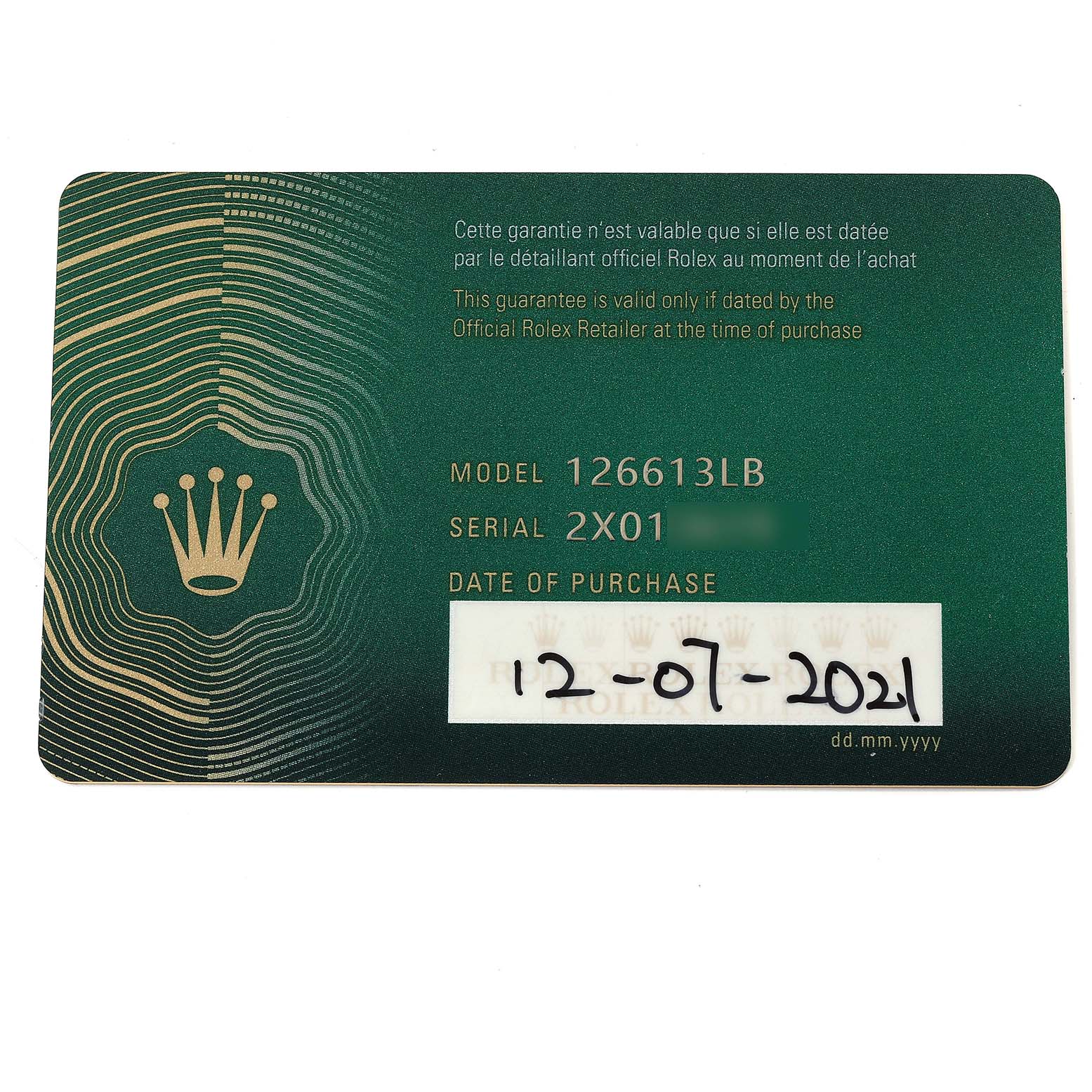 This image shows a Rolex guarantee card for a Submariner model 126613LB, detailing the serial number and purchase date.