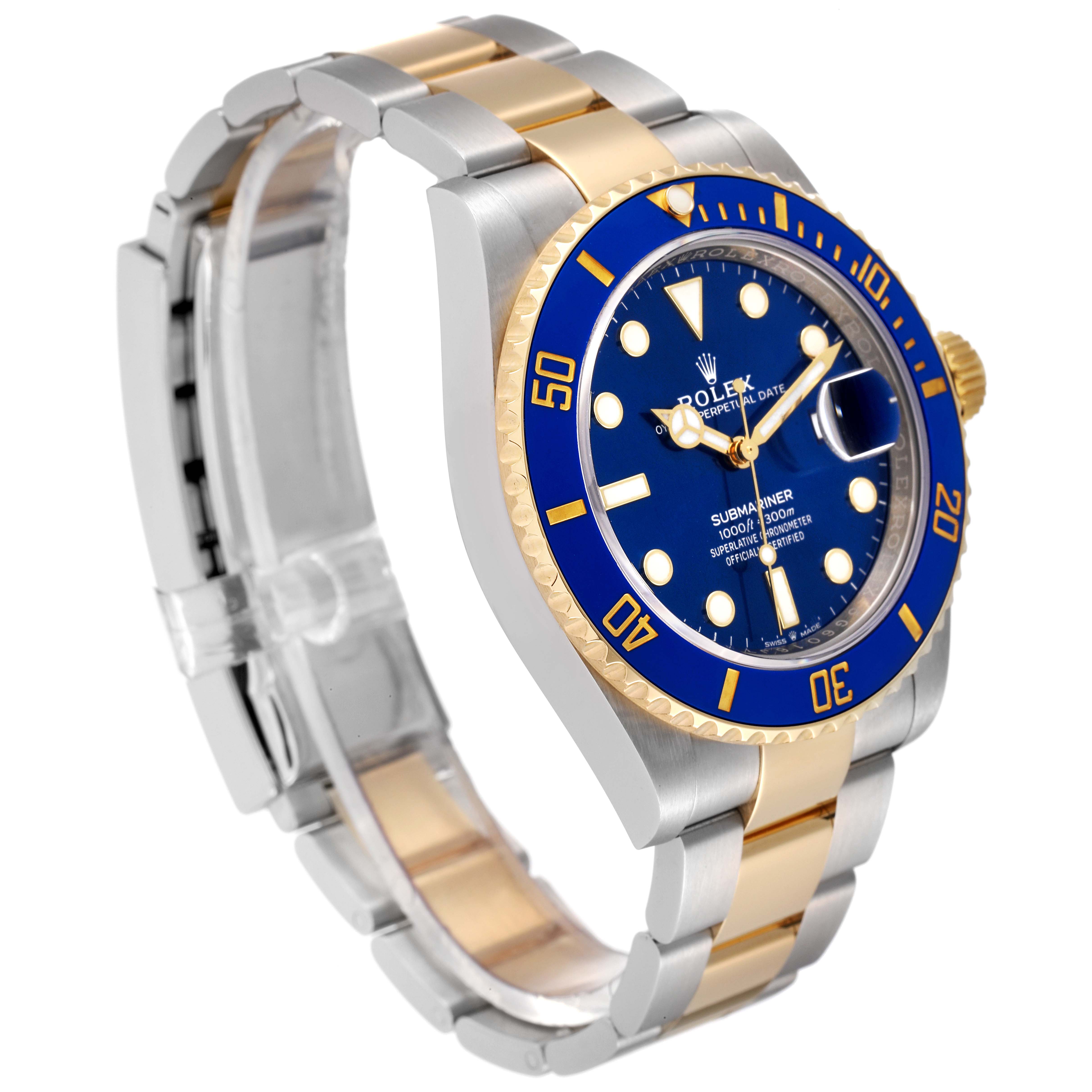 A Rolex Submariner 126613 Men's Steel and Gold (two tone) Blue Dial 126613 Men's Steel and Gold (two tone) Blue Dial watch is shown at a three-quarter angle, highlighting its blue dial and bezel, two-tone metal strap, and crown.