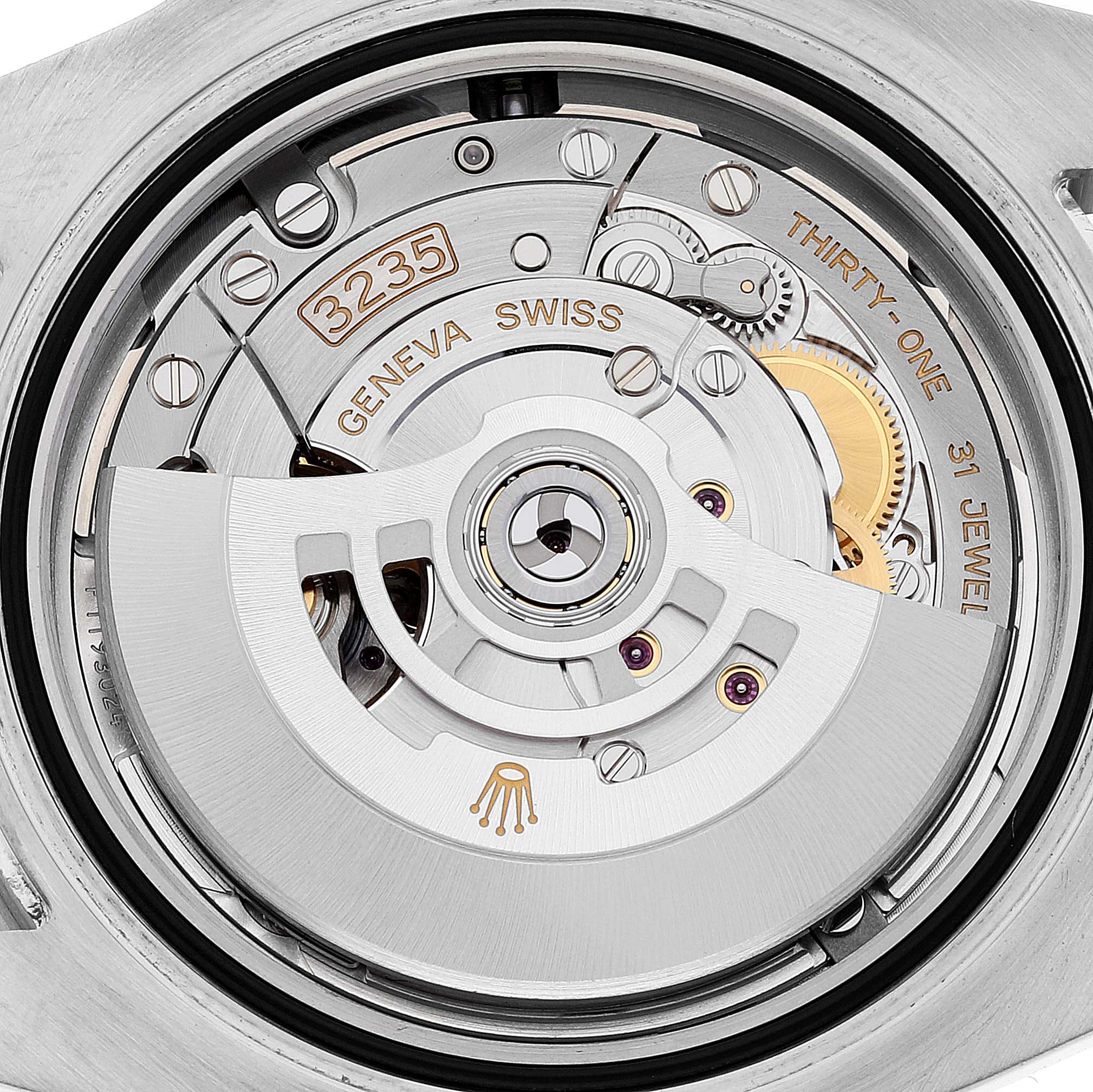 The image shows the rotor and internal mechanism of a Rolex Submariner 126613 Men's Steel and Gold (two tone) Blue Dial 126613 Men's Steel and Gold (two tone) Blue Dial watch viewed from the back.