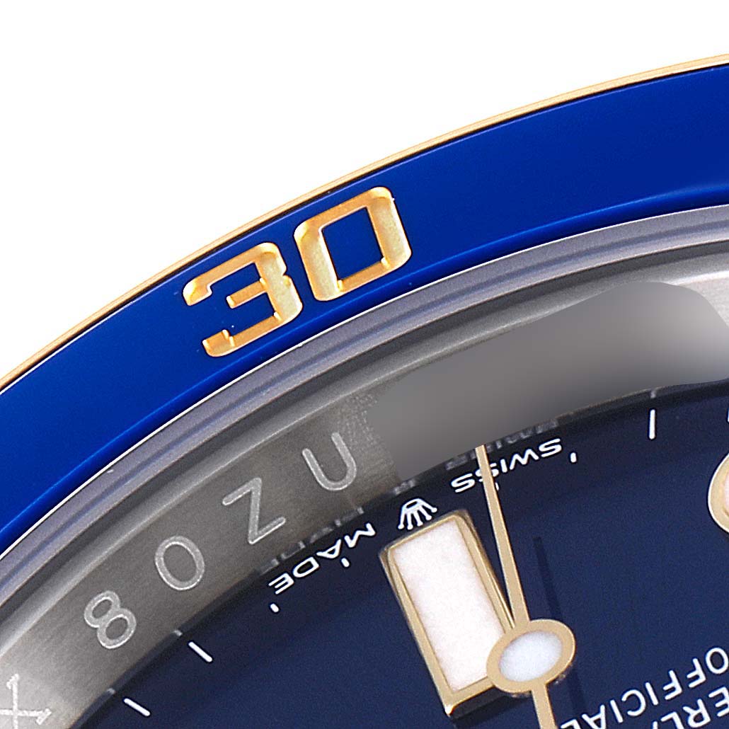 The image shows a close-up view of the dial and bezel of a Rolex Submariner 126613LB Men's Steel and Gold (two tone) Blue Dial 126613LB Men's Steel and Gold (two tone) Blue Dial watch focusing on the number 30.