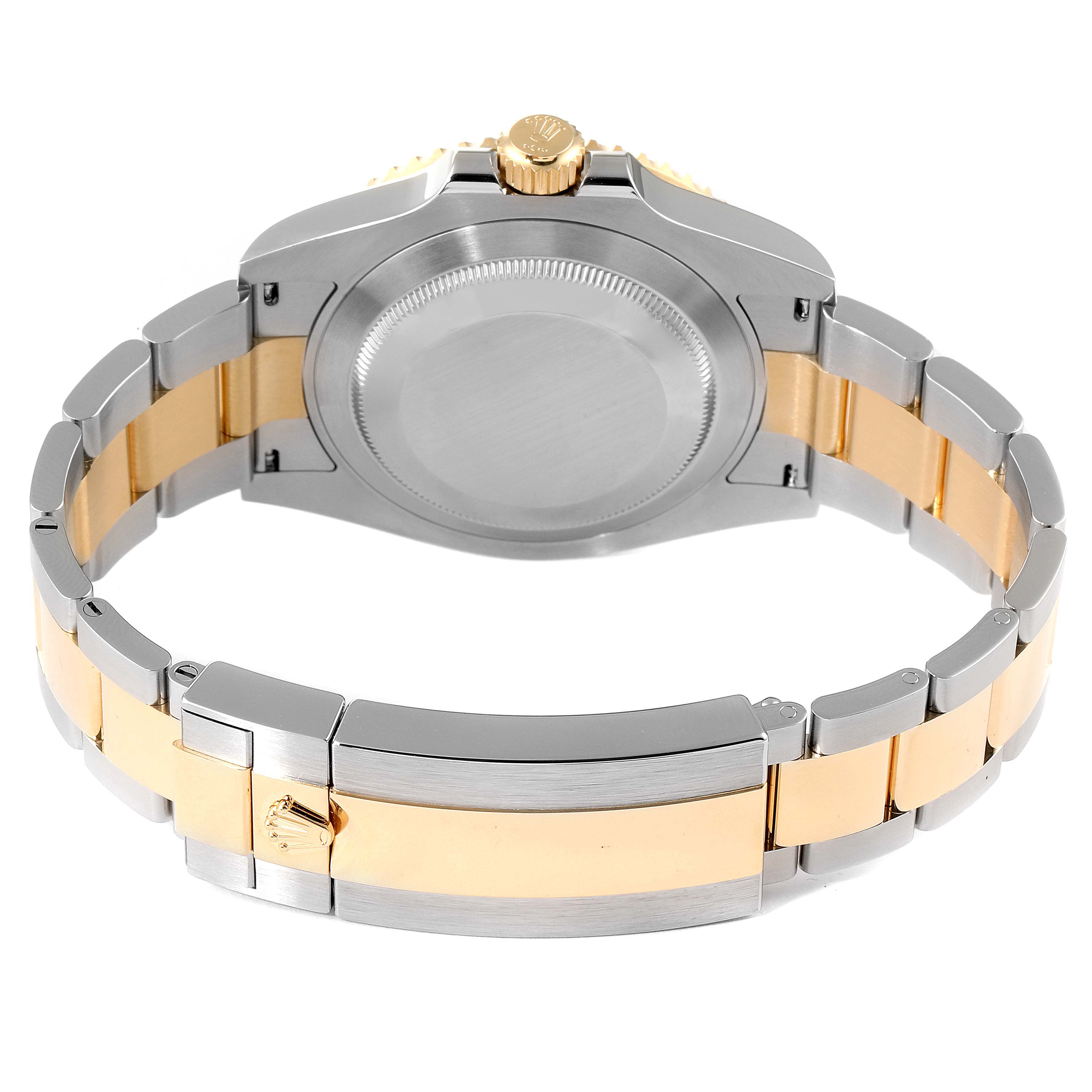 This image shows the back view of a Rolex Submariner 126613LB Men's Steel and Gold (two tone) Blue Dial 126613LB Men's Steel and Gold (two tone) Blue Dial watch, highlighting its two-tone bracelet and closed case back.