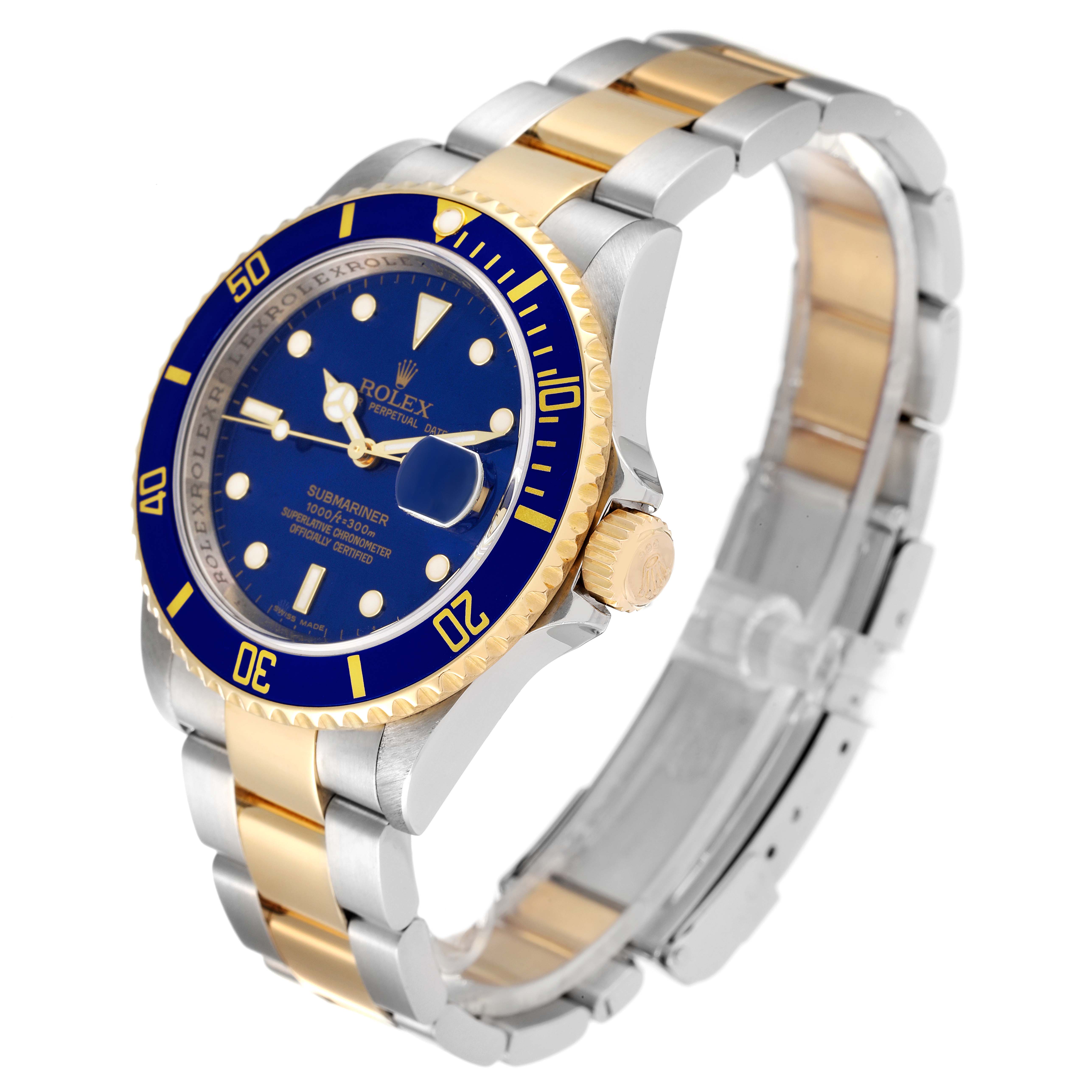 This image shows a Rolex Submariner 16613 Men's Steel and Gold (two tone) Blue Dial 16613 Men's Steel and Gold (two tone) Blue Dial watch at a slight angle, illustrating its blue dial, gold bezel, and two-tone bracelet.