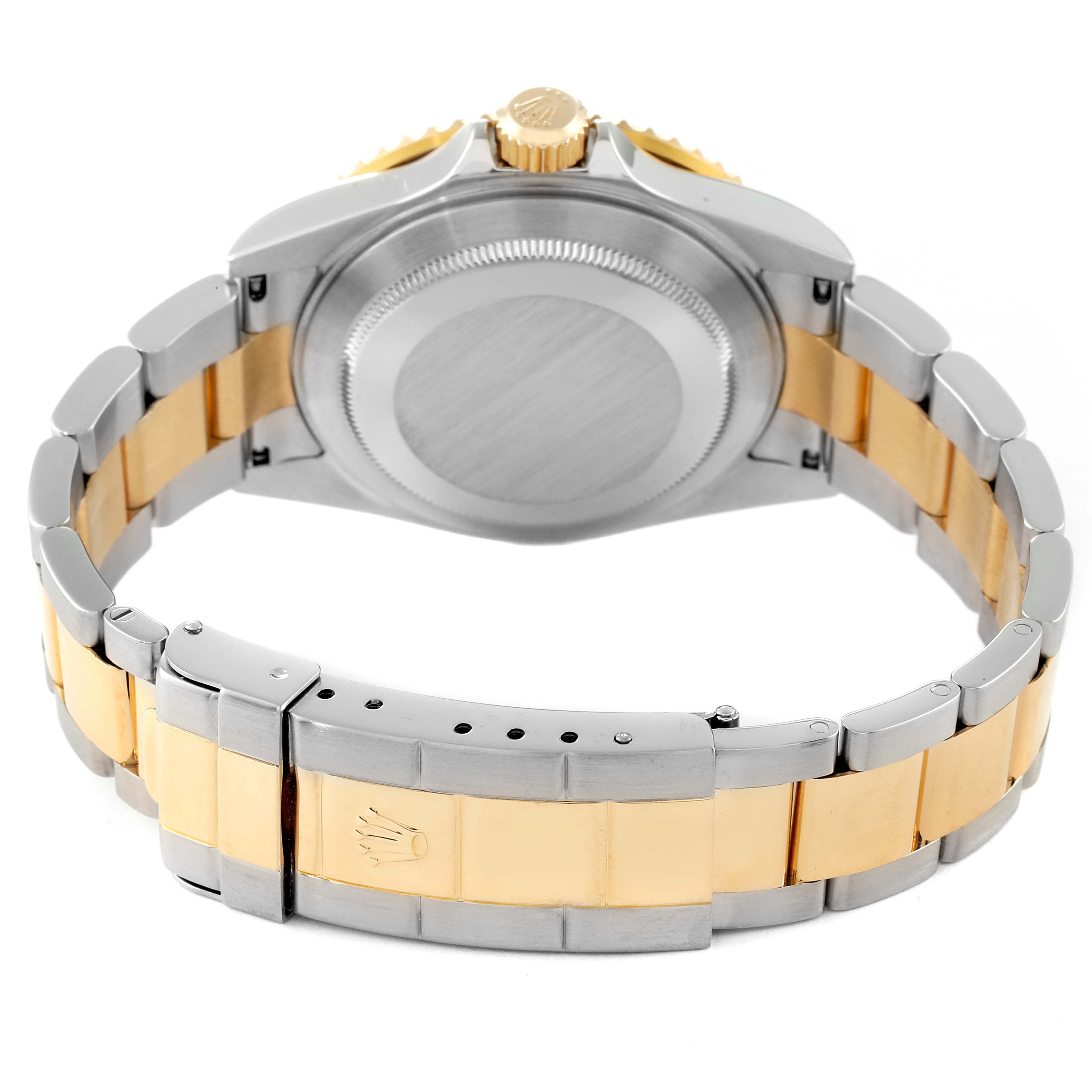 The image shows the back case and bracelet of a Rolex Submariner 16613 Men's Steel and Gold (two tone) Blue Dial 16613 Men's Steel and Gold (two tone) Blue Dial, highlighting its bi-metal design.