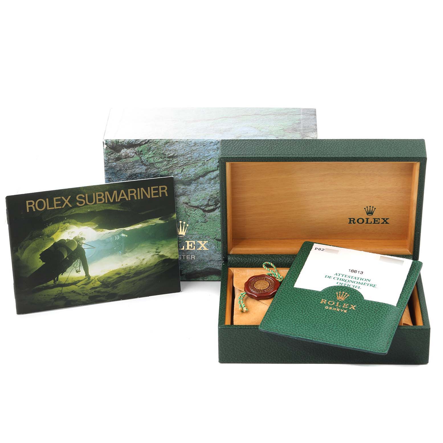 The image shows the packaging, warranty card holder, manual, and presentation box for a Rolex Submariner 16613 Men's Steel and Gold (two tone) Black Dial 16613 Men's Steel and Gold (two tone) Black Dial watch.