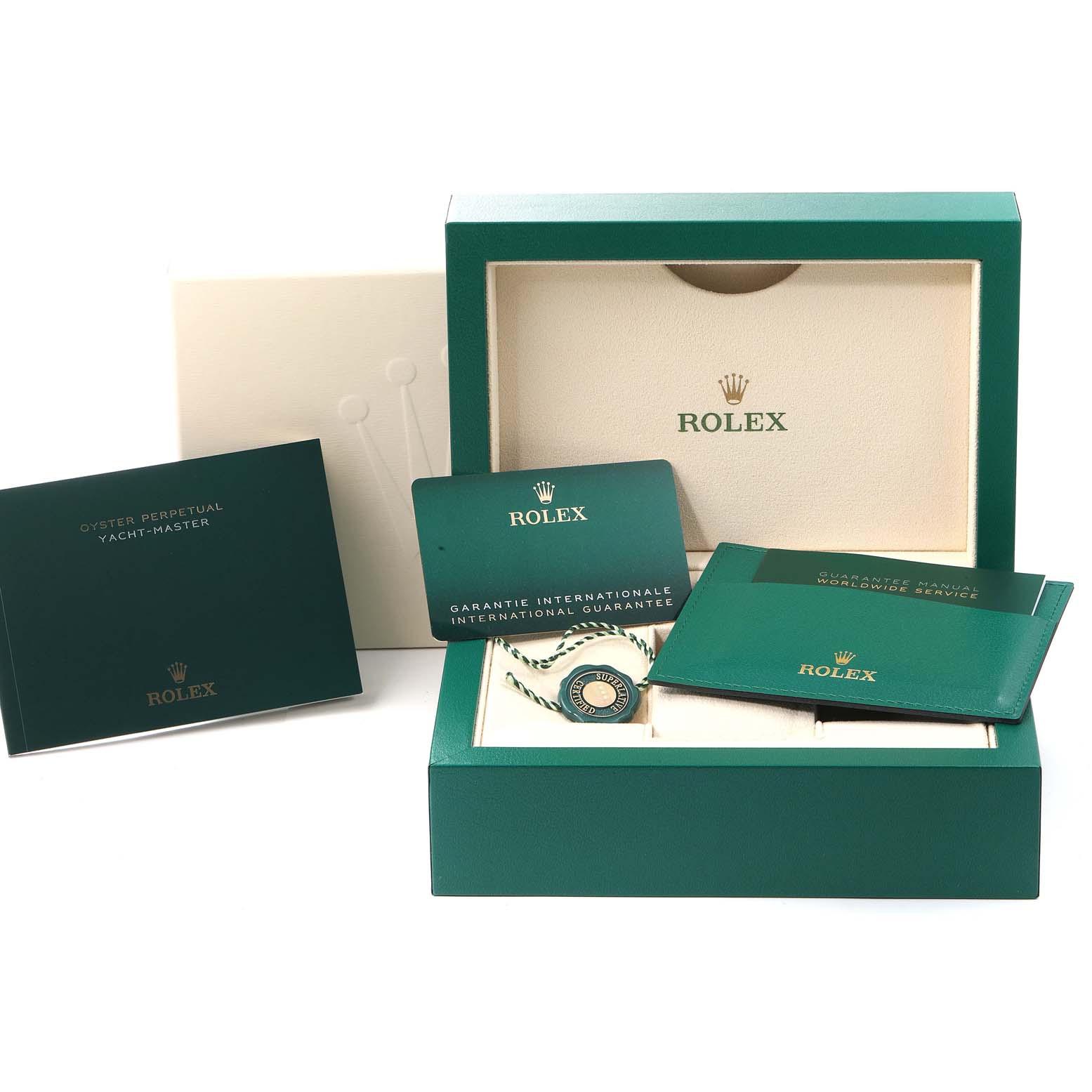 This image of the Rolex Yacht-Master 268622 Men's Stainless Steel Grey Dial 268622 Men's Stainless Steel Grey Dial includes the watch box, manual, guarantee cards, and hang tags viewed from a front angle.