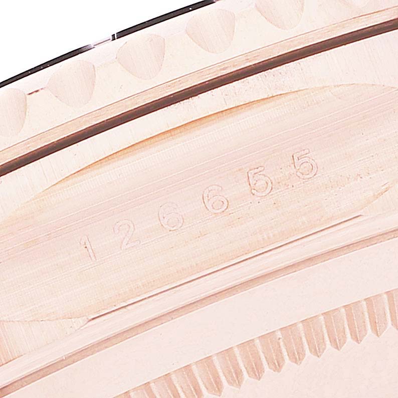 This close-up image shows the engraved model number (126655) on the bezel edge of a Rolex Yacht-Master 126655 Men
s Rose Gold Black Dial 126655 Men
s Rose Gold Black Dial watch.