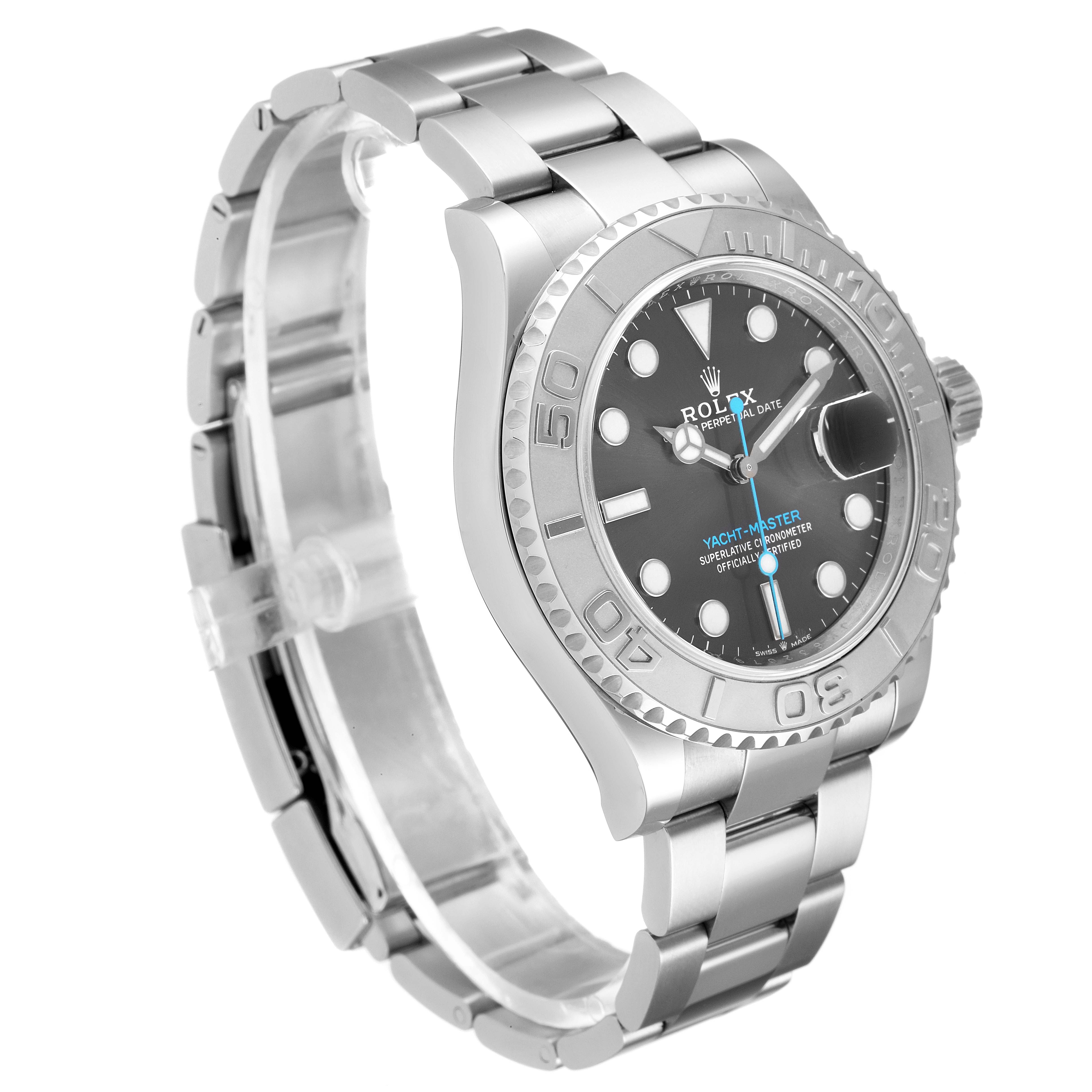 The Yacht-Master Rolex watch is shown at a slight angle, highlighting its face, bezel, and bracelet.