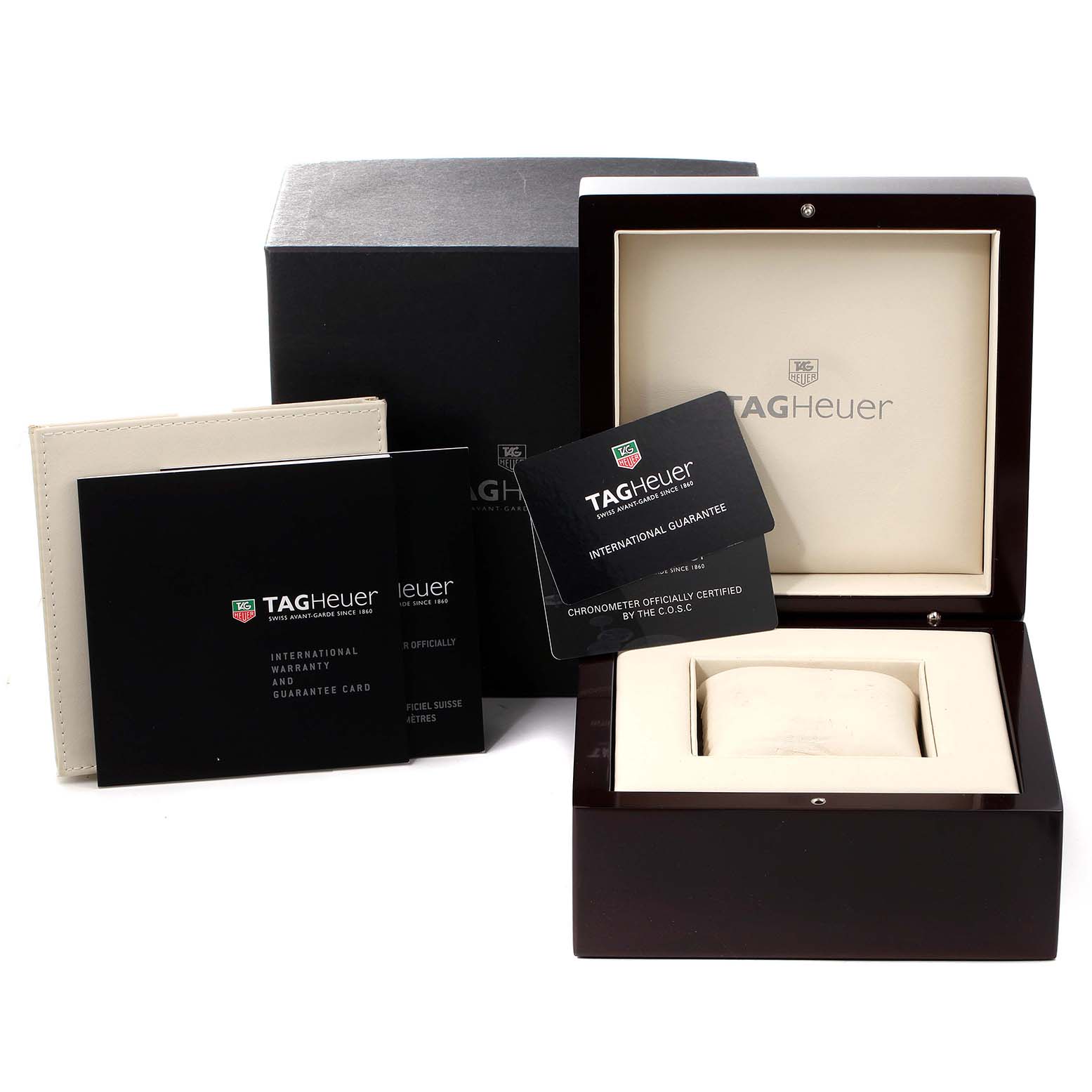 The image shows the packaging, international guarantee card, and warranty booklets for the Tag Heuer Carrera WAV511C.BA0900 Men's Stainless Steel Brown Dial WAV511C.BA0900 Men's Stainless Steel Brown Dial model watch.