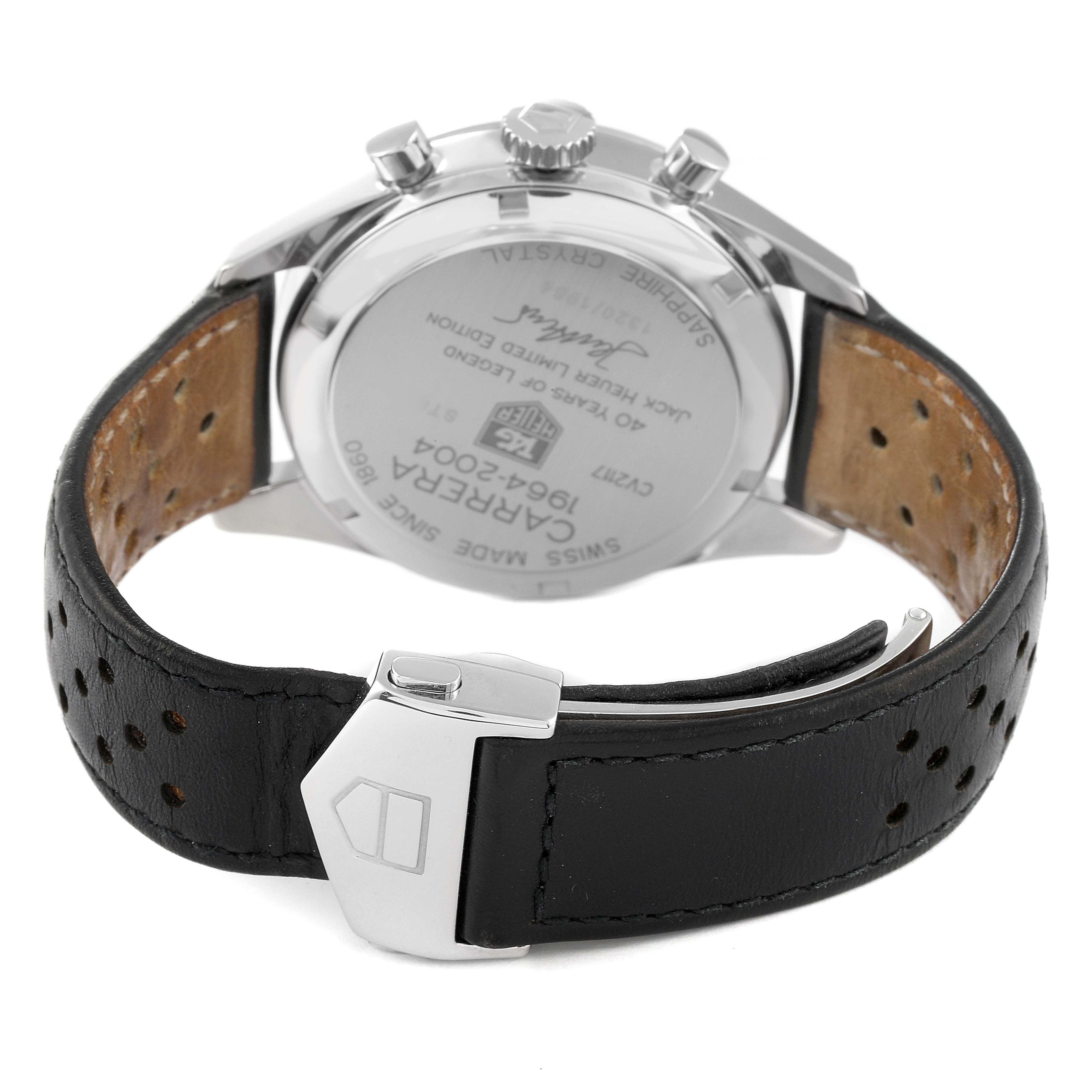 This image shows the back view of a TAG Heuer Carrera watch, capturing the case back and black leather strap with a clasp.