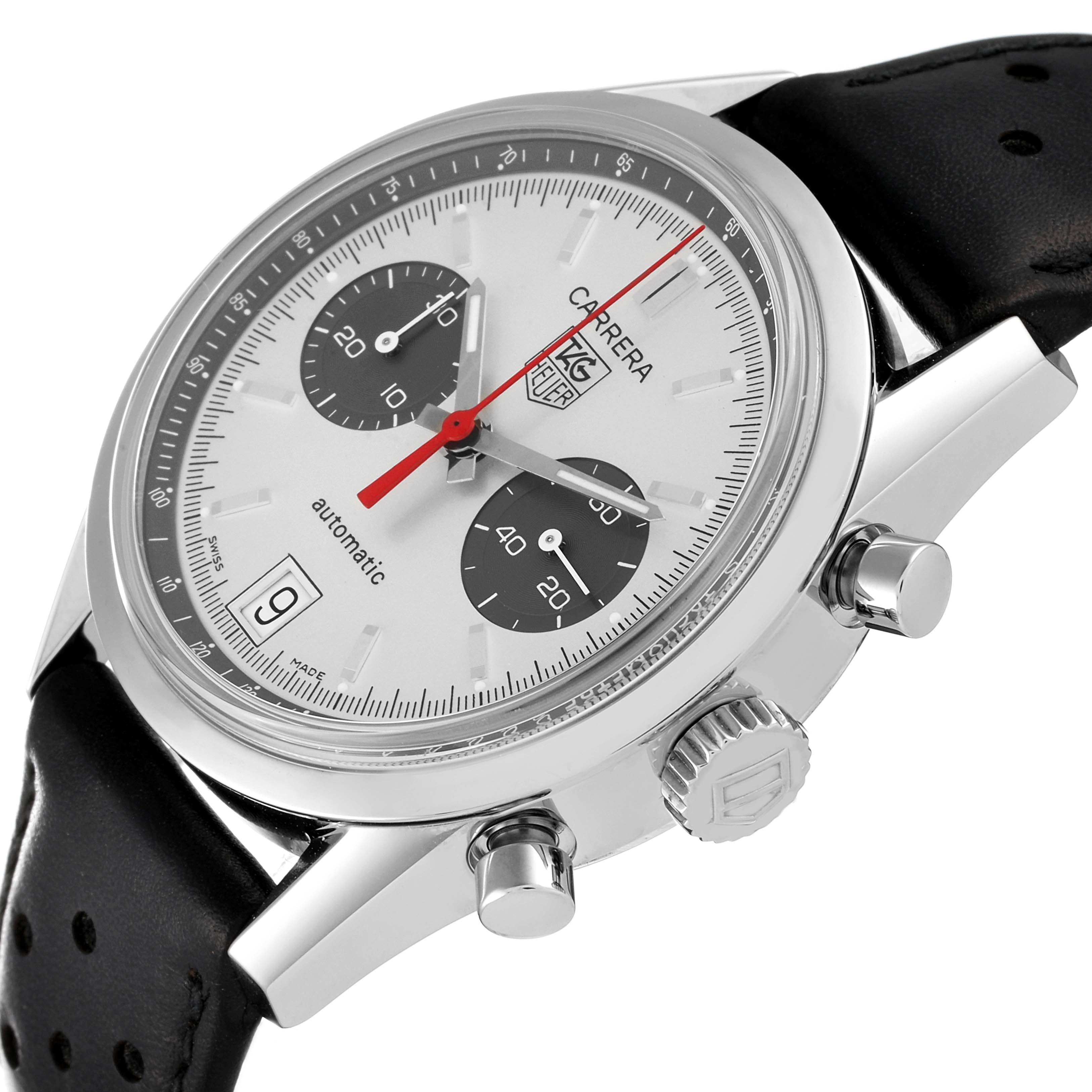 The Tag Heuer Carrera watch is shown at an angle highlighting the face, crown, push buttons, and part of the strap.