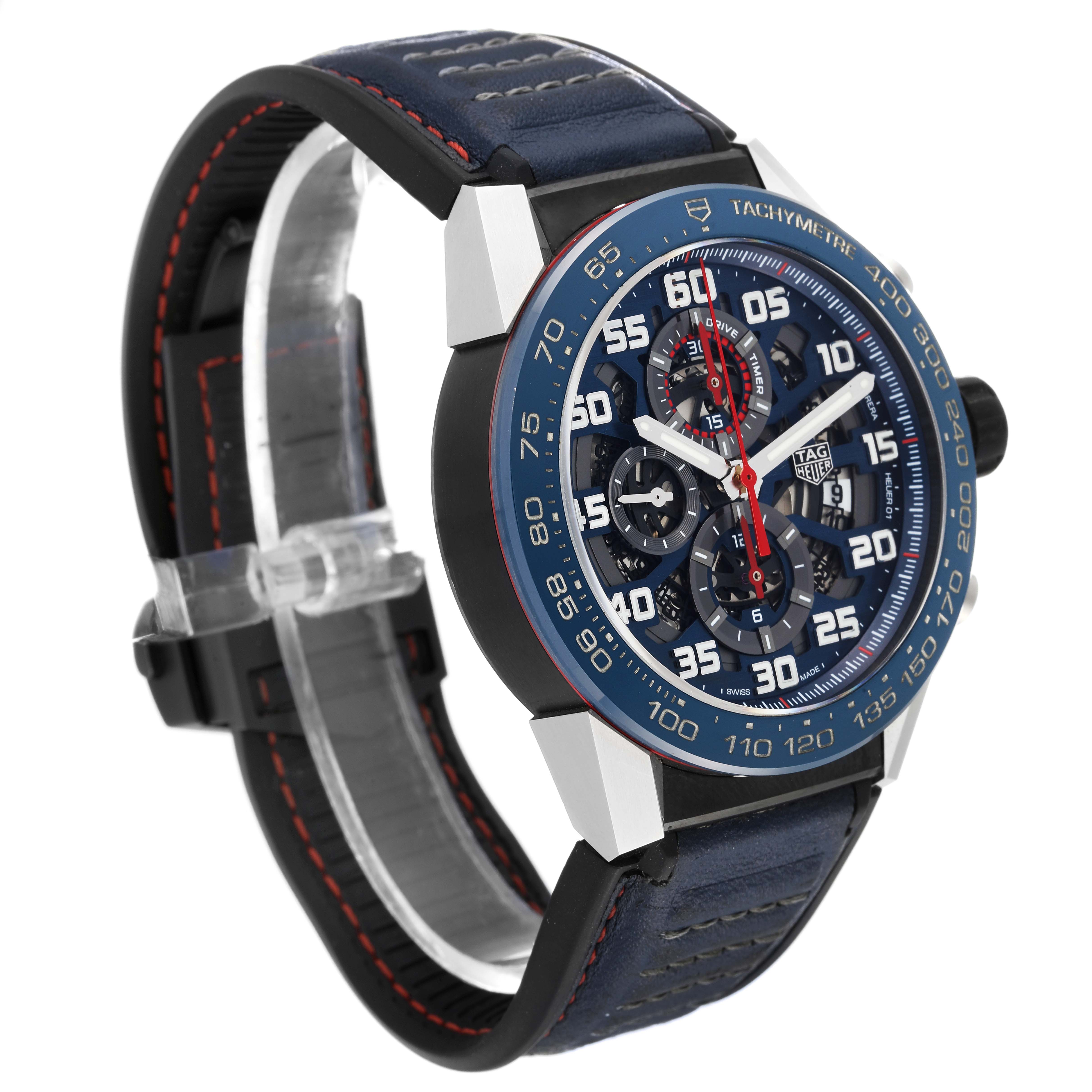 The image shows a three-quarter view of the Tag Heuer Carrera CAR2A1N.FT6100 Men's Stainless Steel Blue Dial CAR2A1N.FT6100 Men's Stainless Steel Blue Dial watch, highlighting its blue dial, bezel, chronograph sub-dials, and strap.