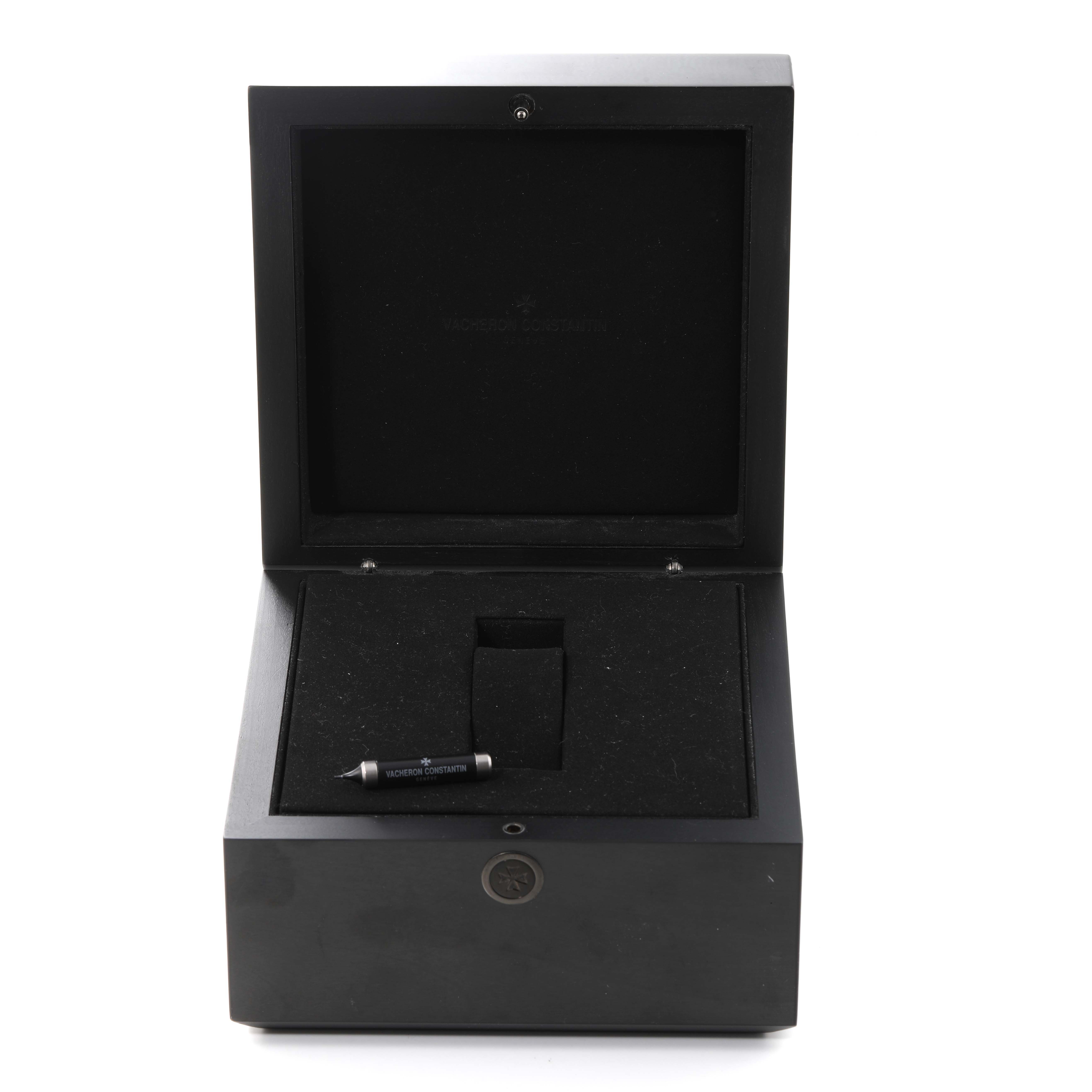 This image shows an open box for the Vacheron Constantin Fiftysix 4400E/000A-B437 Men's Stainless Steel Silver Dial 4400E/000A-B437 Men's Stainless Steel Silver Dial model watch, including a branded tool inside.