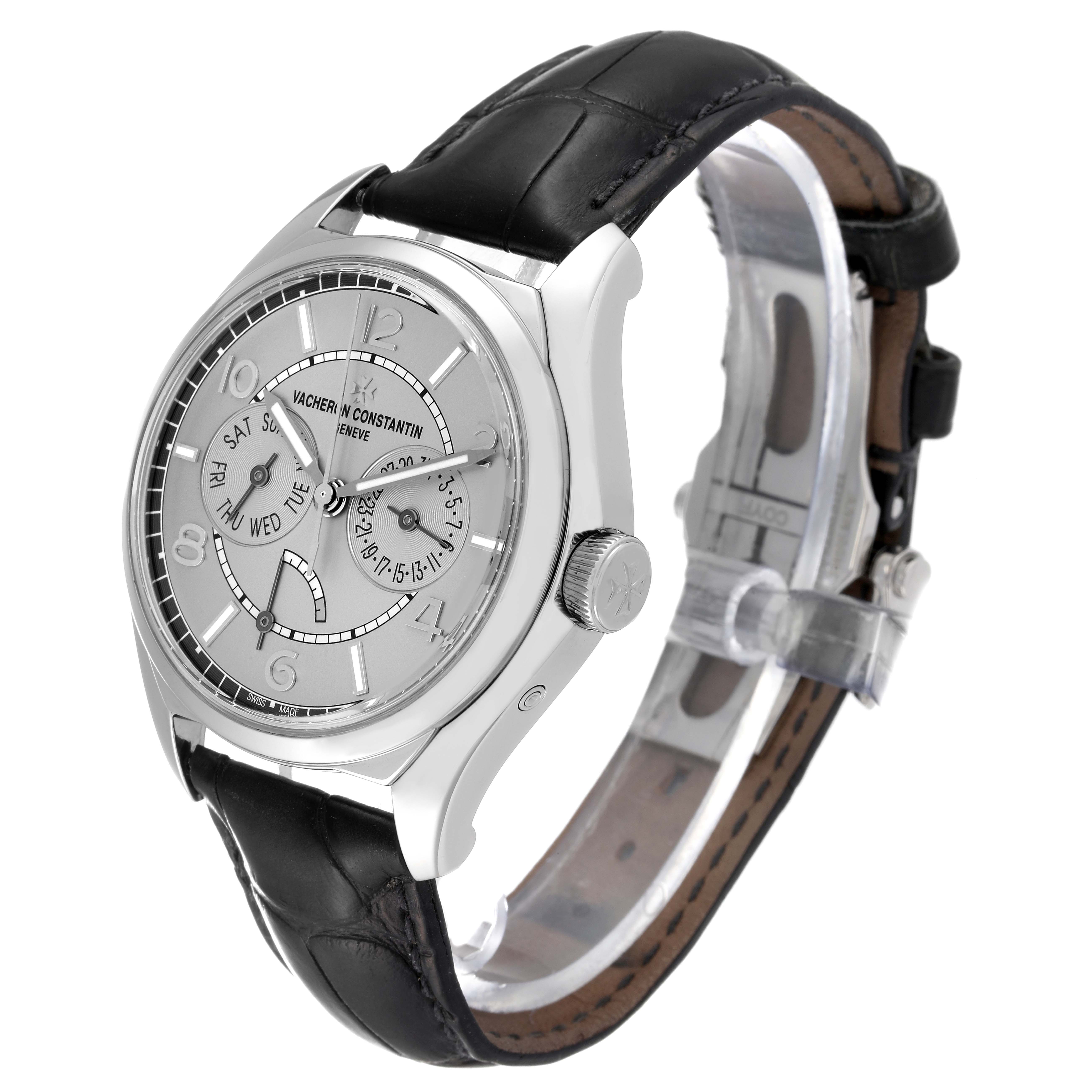 This Vacheron Constantin Fiftysix 4400E/000A-B437 Men's Stainless Steel Silver Dial 4400E/000A-B437 Men's Stainless Steel Silver Dial watch is shown from a three-quarter angle, highlighting its dial, casing, crown, and strap.