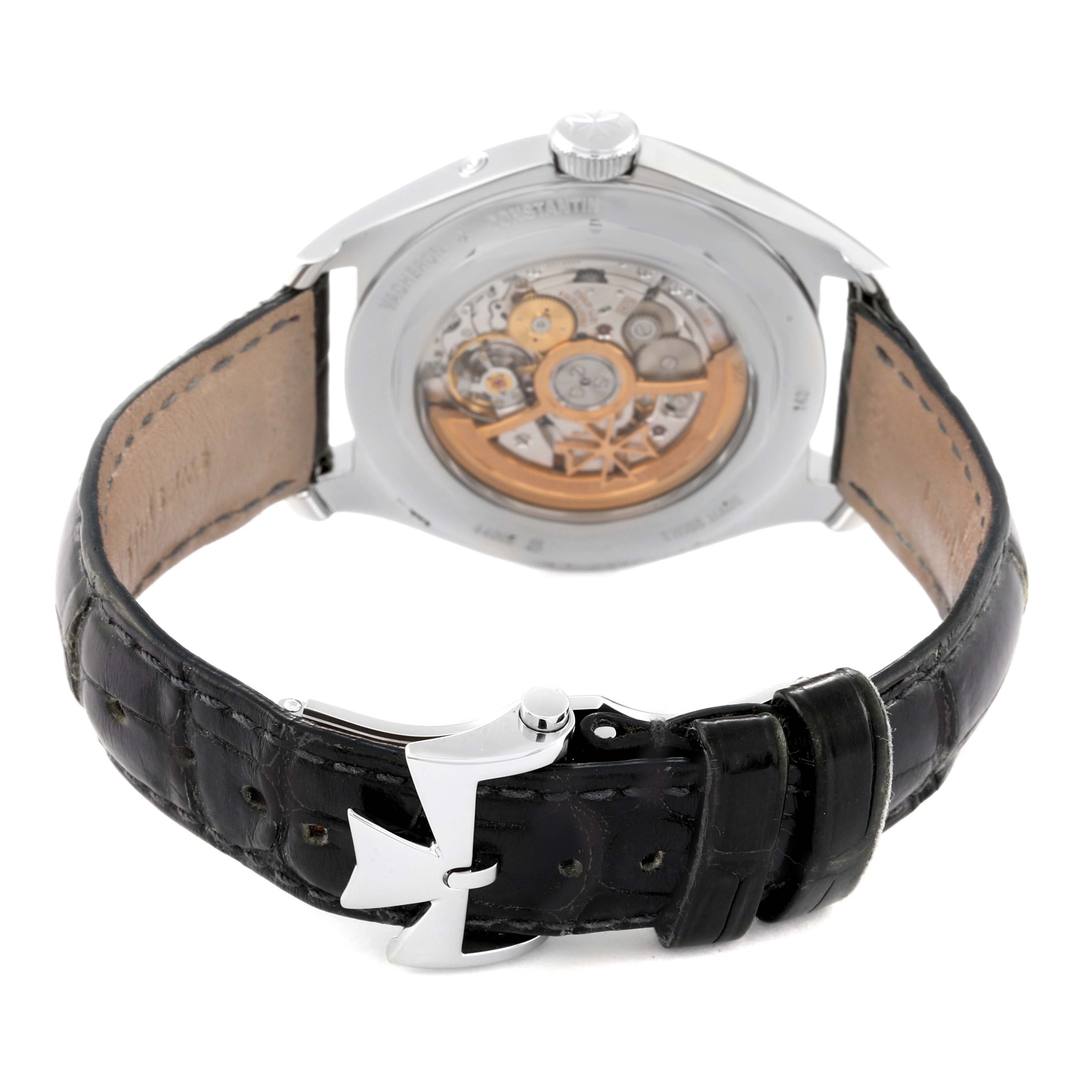 The image shows the back view of a Vacheron Constantin Fiftysix 4400E/000A-B437 Men's Stainless Steel Silver Dial 4400E/000A-B437 Men's Stainless Steel Silver Dial watch, highlighting its movement and black leather strap with a distinctive clasp.