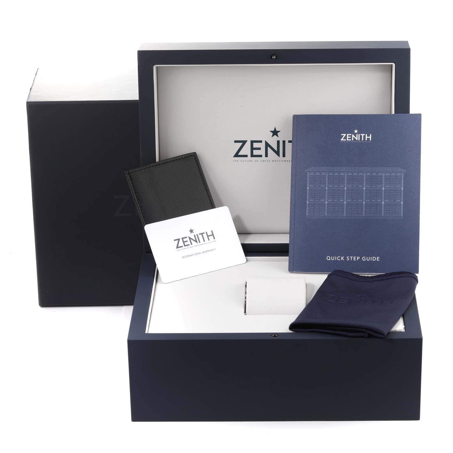 The image shows the packaging and accessories for the Zenith Chronomaster 03.3100.3600 Men's Stainless Steel White Dial 03.3100.3600 Men's Stainless Steel White Dial, including a box, manual, warranty card, and cloth.