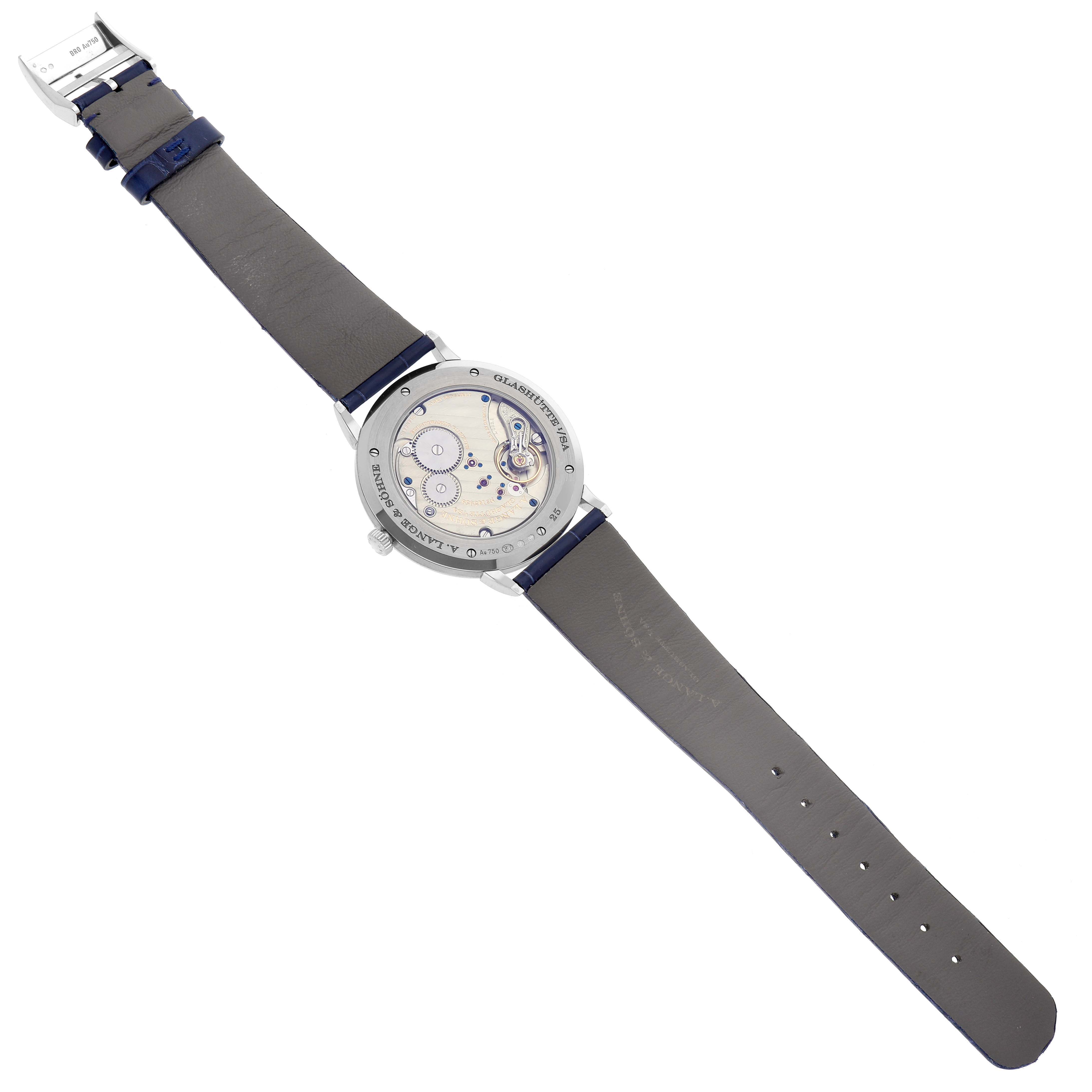 The image shows the back of the A. Lange & Sohne Saxonia 205.086 Men's White Gold Blue Dial, displaying its movement and leather strap.