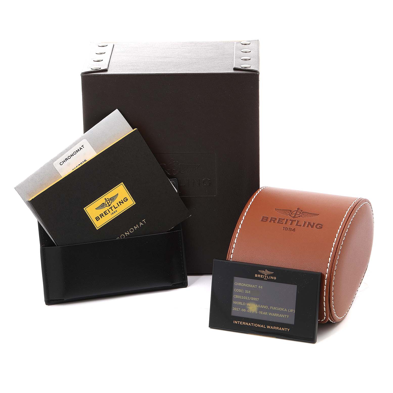 The image shows a Breitling Chronomat CB0110 Men's Rose Gold Black Dial CB0110 Men's Rose Gold Black Dial watch box, case, manuals, and an international warranty card, all arranged front-facing.