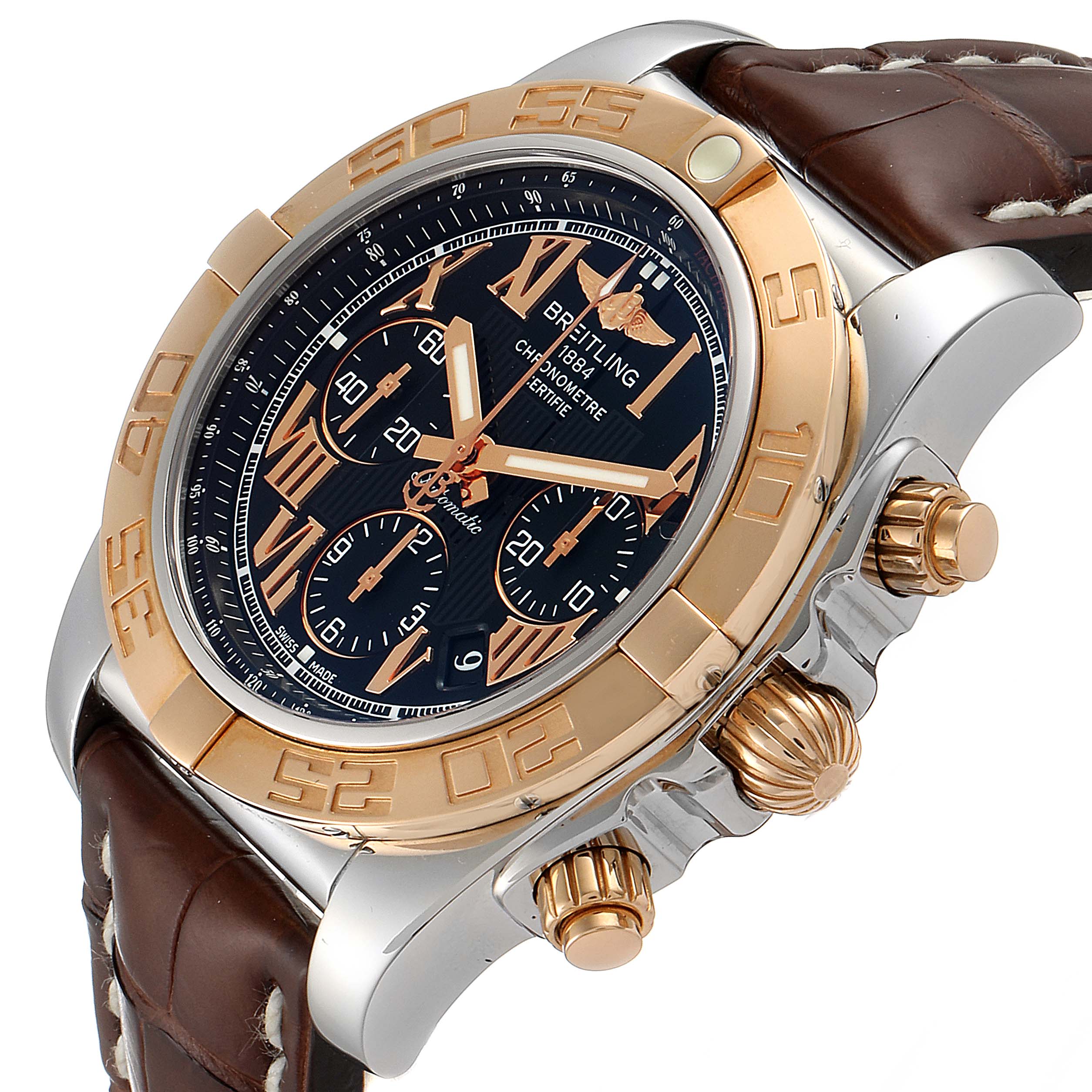 The image shows a close-up angled view of the Breitling Chronomat CB0110 Men's Rose Gold Black Dial CB0110 Men's Rose Gold Black Dial watch highlighting its dial, bezel, and crown.