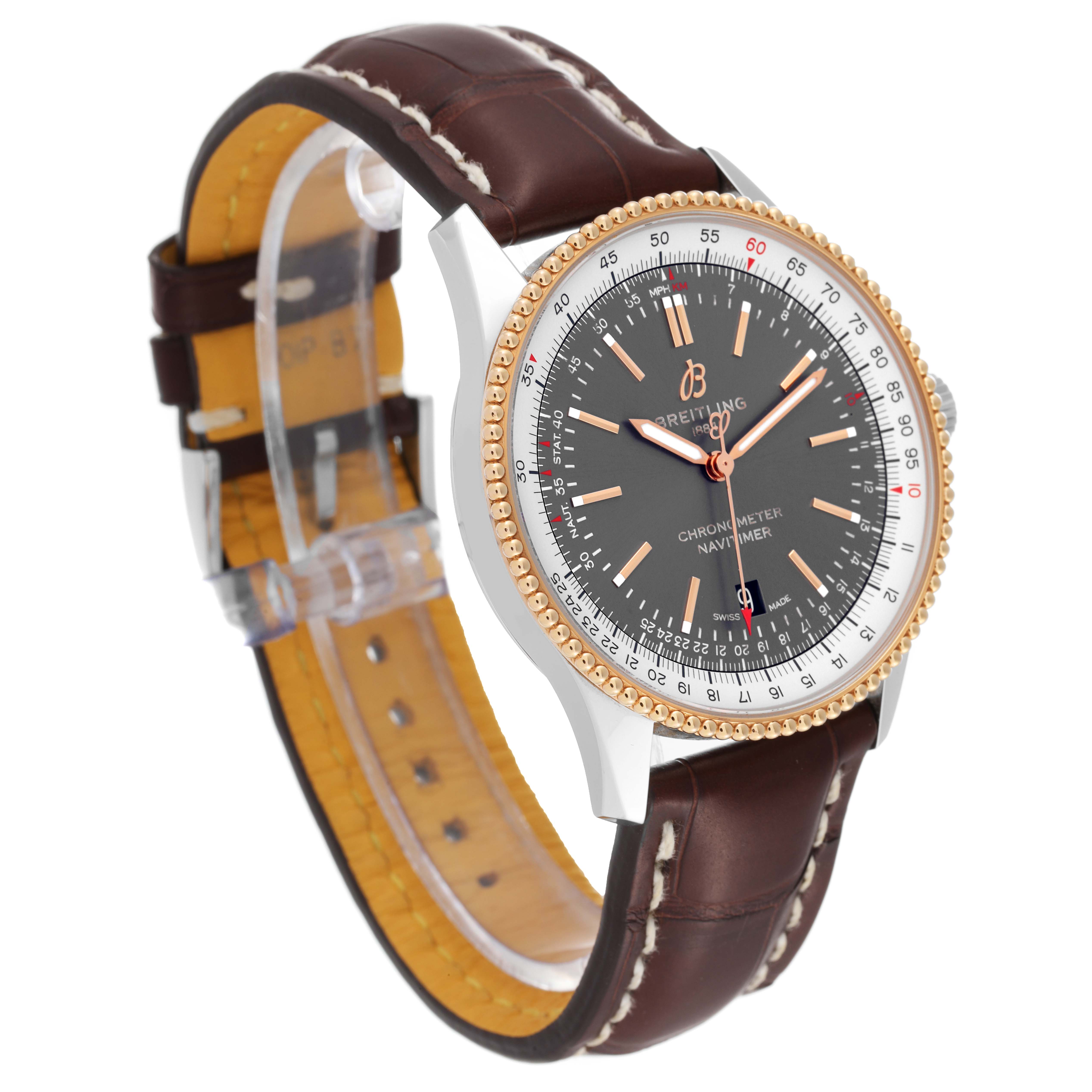 The Breitling Navitimer U17326 Men's Steel and Gold (two tone) Grey Dial U17326 Men's Steel and Gold (two tone) Grey Dial watch is shown at a three-quarter angle, displaying its face, brown leather strap, and gold bezel.