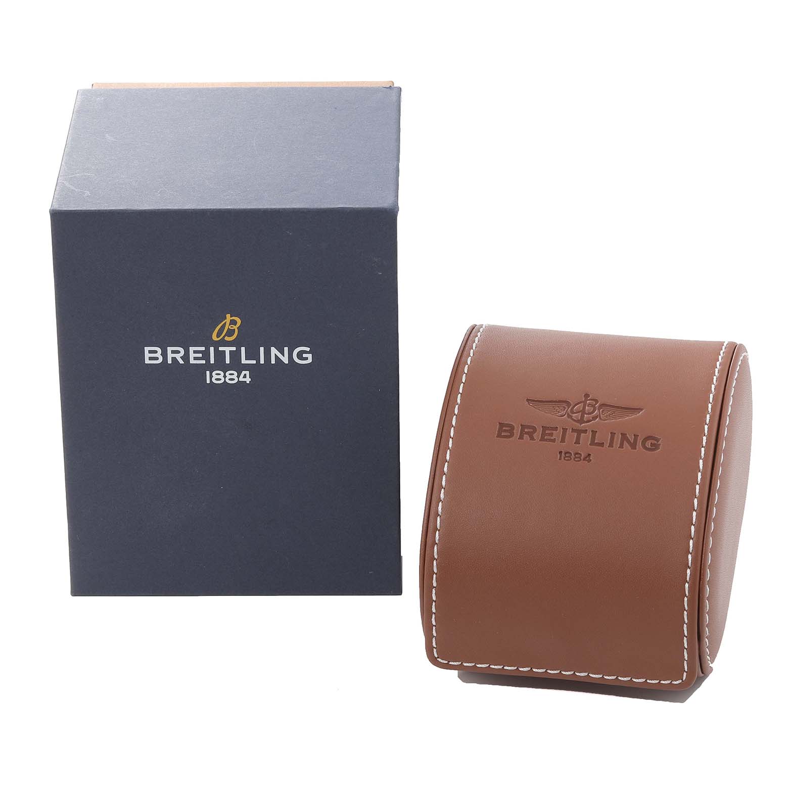 The image shows a Breitling Navitimer U17326 Men's Steel and Gold (two tone) Grey Dial U17326 Men's Steel and Gold (two tone) Grey Dial watch box and a leather travel case, viewed from the front.