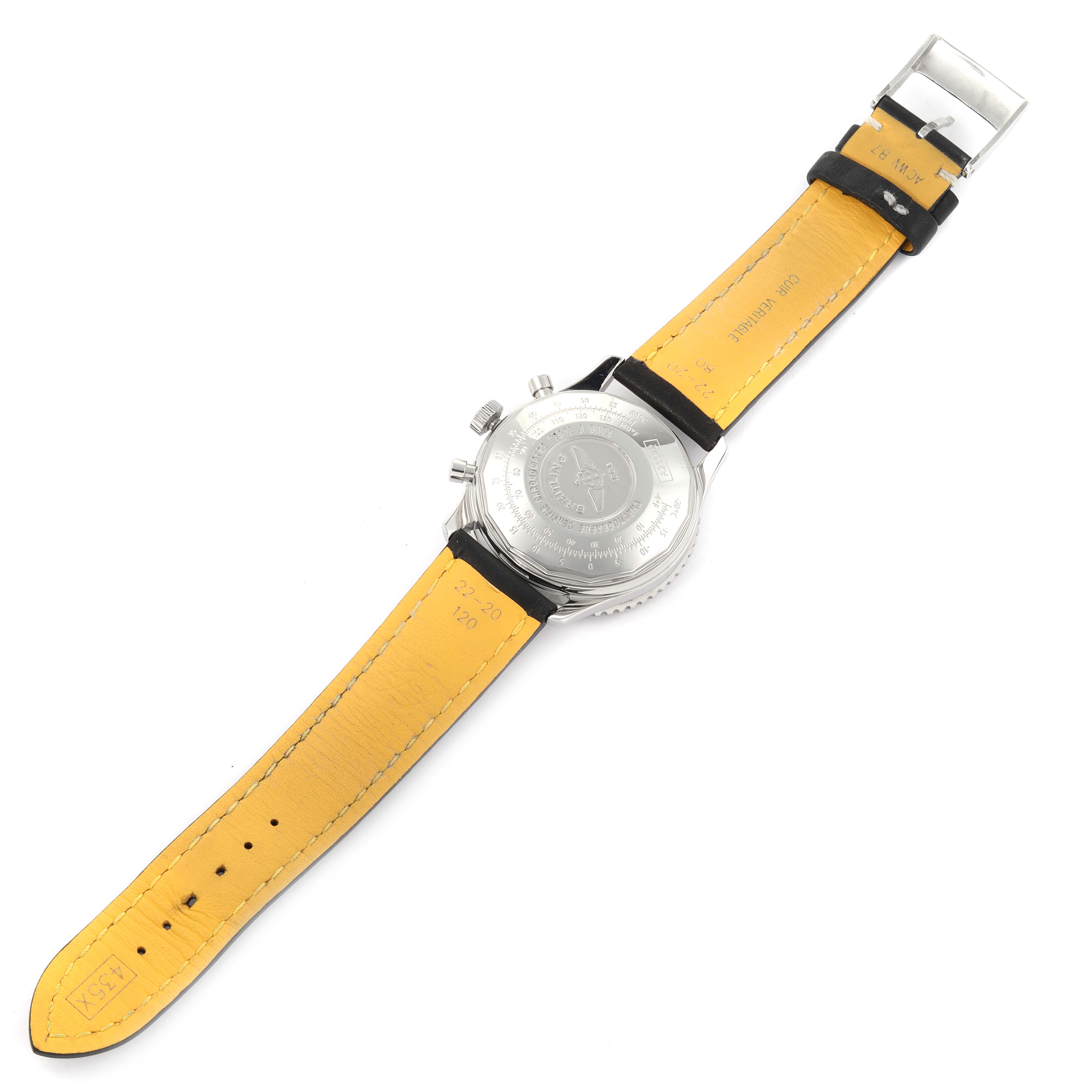 The image shows the back side of a Breitling Navitimer A23322 Men's Stainless Steel Black Dial A23322 Men's Stainless Steel Black Dial watch, displaying the case back and yellow leather strap.