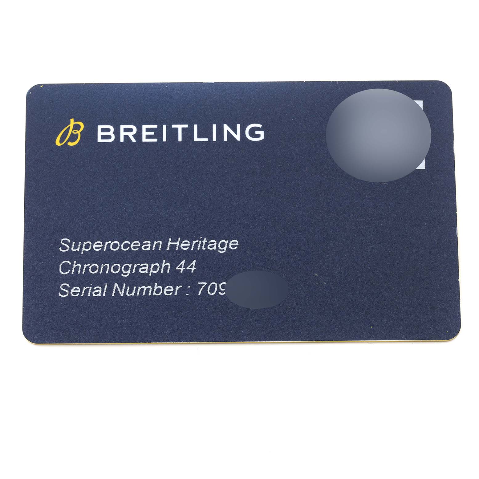 The image shows a warranty or authentication card for the Breitling Superocean M13313 Men's Stainless Steel Blue Dial M13313 Men's Stainless Steel Blue Dial Heritage Chronograph 44 watch.