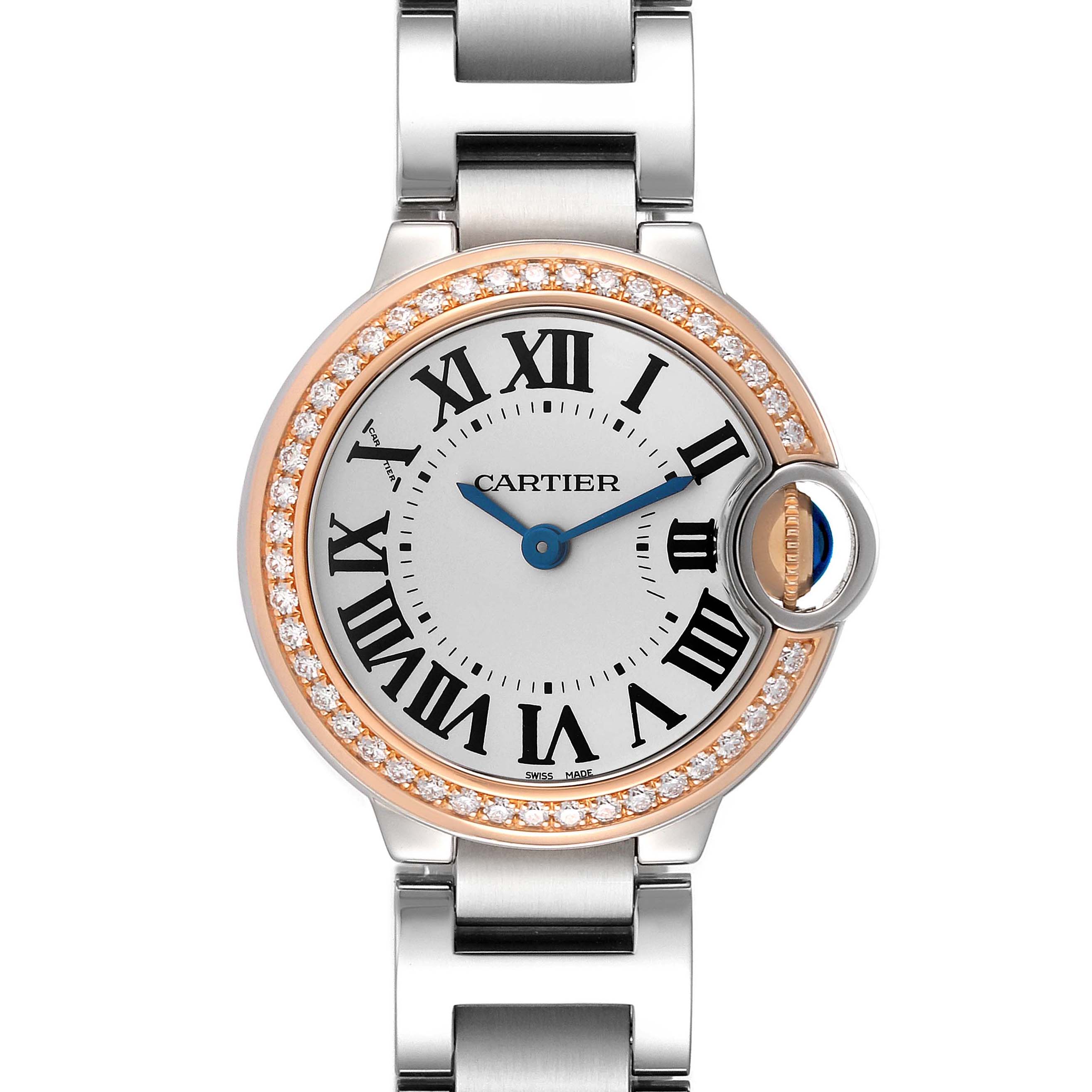 The Cartier Ballon Bleu WE902079 Women's Steel and Gold (two tone) Silver Dial watch is shown from a top view, highlighting the face, bezel, and part of the bracelet.