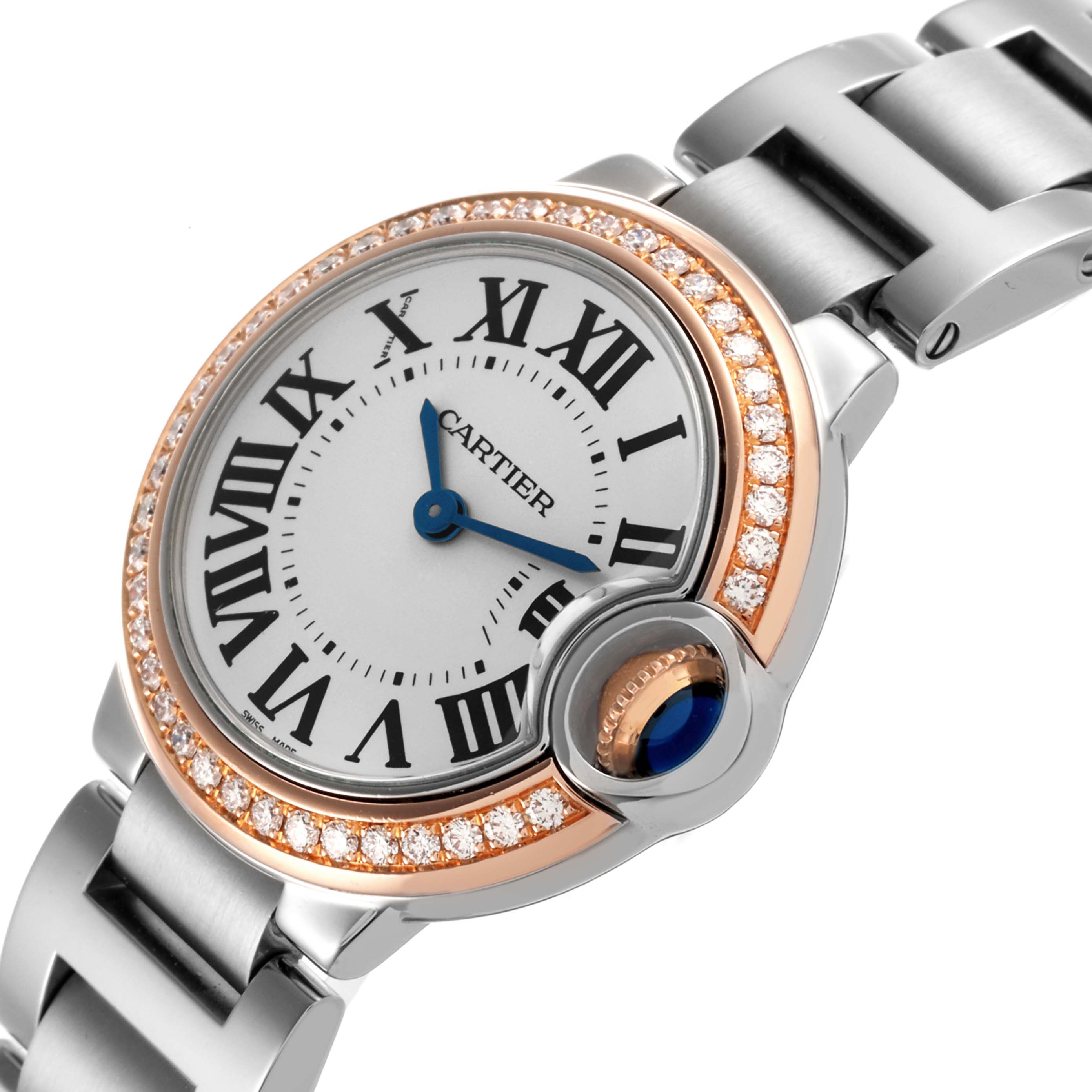 The Cartier Ballon Bleu WE902079 Women's Steel and Gold (two tone) Silver Dial WE902079 Women's Steel and Gold (two tone) Silver Dial watch is shown at an angle highlighting the dial, diamond bezel, crown, and part of the bracelet.
